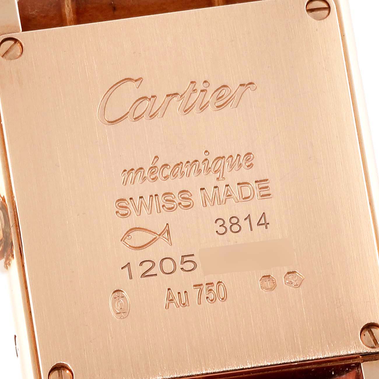 This close-up image shows the back case of a Cartier Tank Louis WGTA0010 Women
s Rose Gold Silver Dial WGTA0010 Women
s Rose Gold Silver Dial watch, highlighting its engraving details.