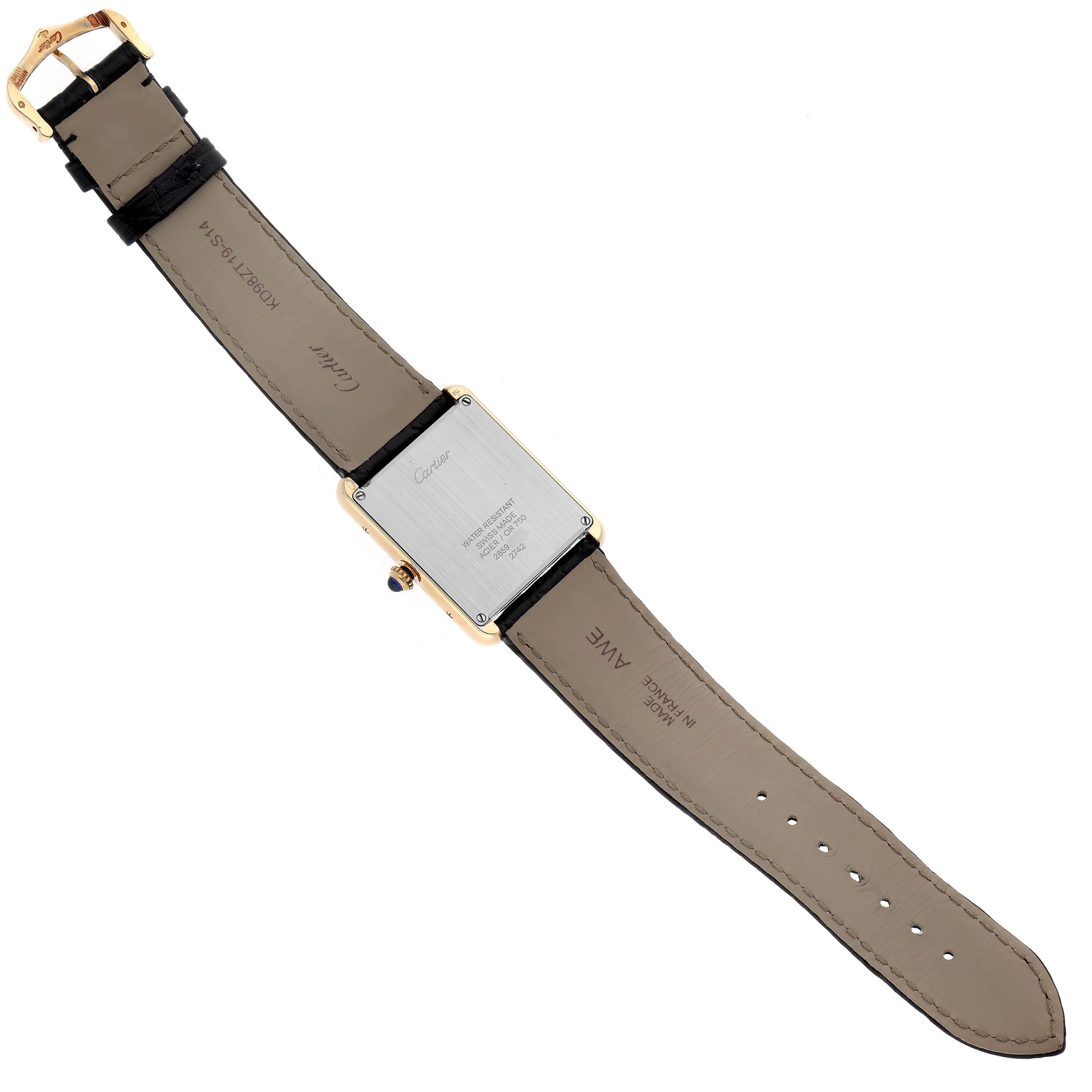 The image shows the back and strap of a Cartier Tank Solo W1018855 Men
s Steel and Gold (two tone) Silver Dial W1018855 Men
s Steel and Gold (two tone) Silver Dial watch, viewed from an overhead angle.