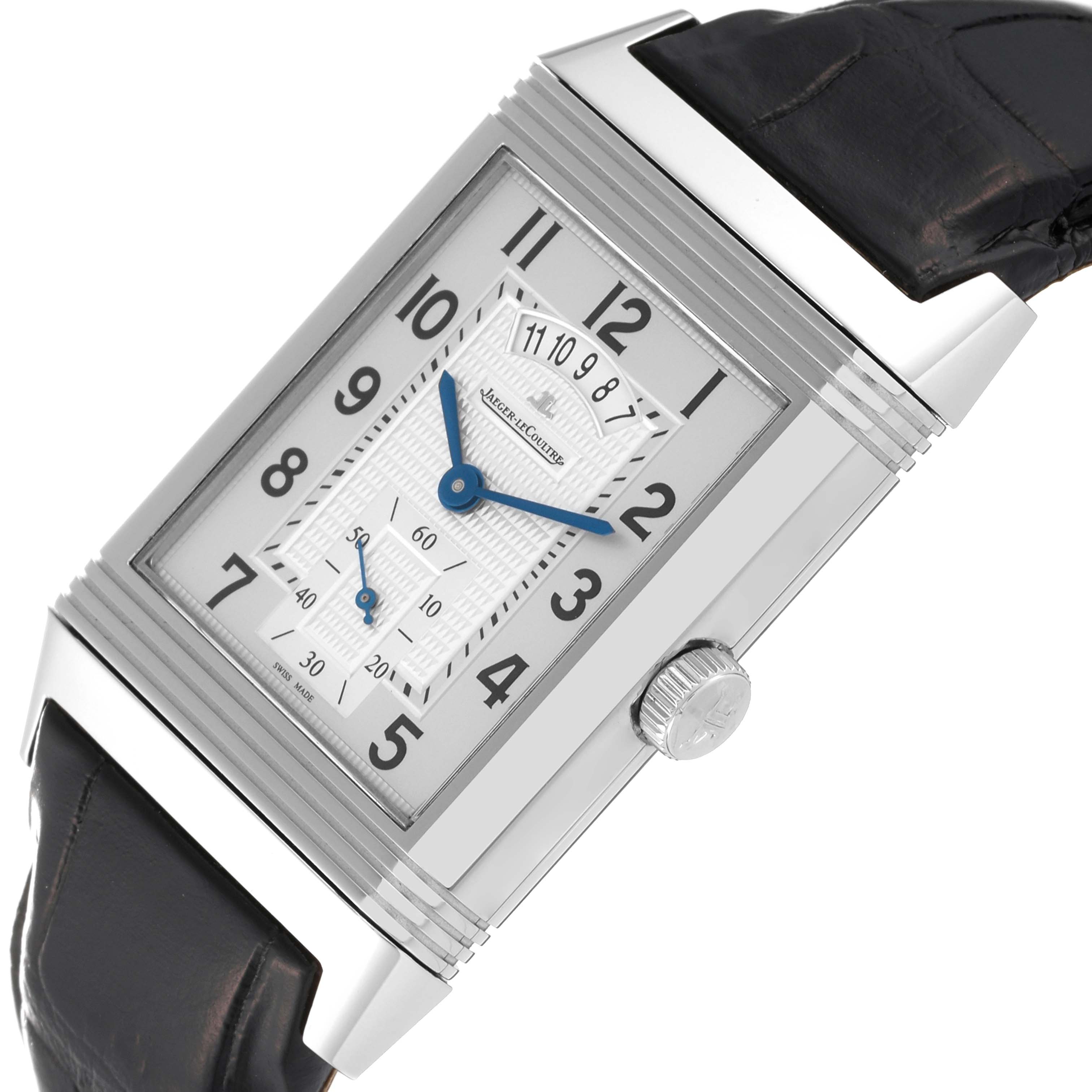 The image shows a Jaeger LeCoultre Reverso Q3748421 Men's Stainless Steel Silver Dial Q3748421 Men's Stainless Steel Silver Dial watch at a slight angle, displaying its dial, crown, and part of the leather strap.