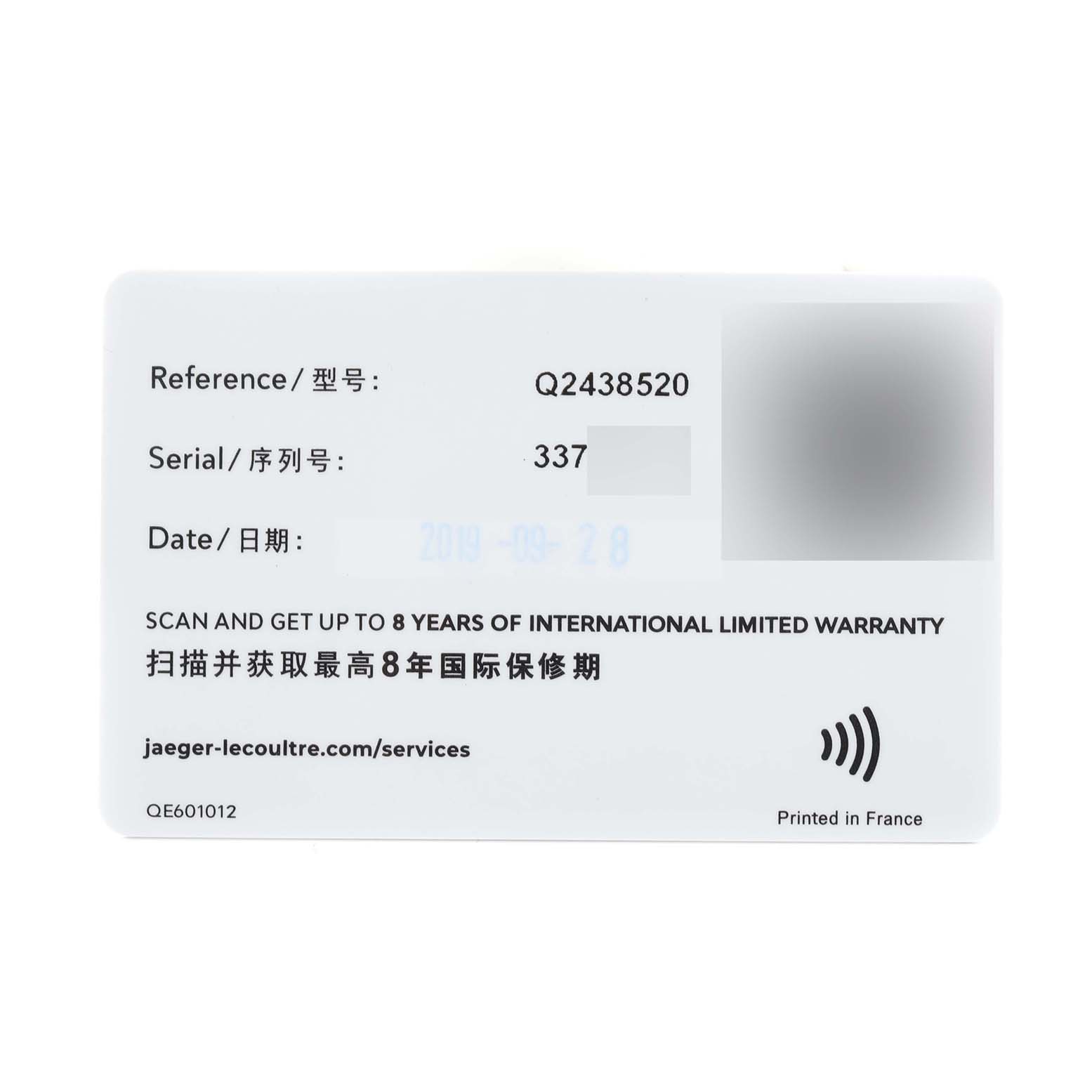 This image shows the warranty card for the Jaeger-LeCoultre Reverso model, displaying the reference, serial number, and warranty details.