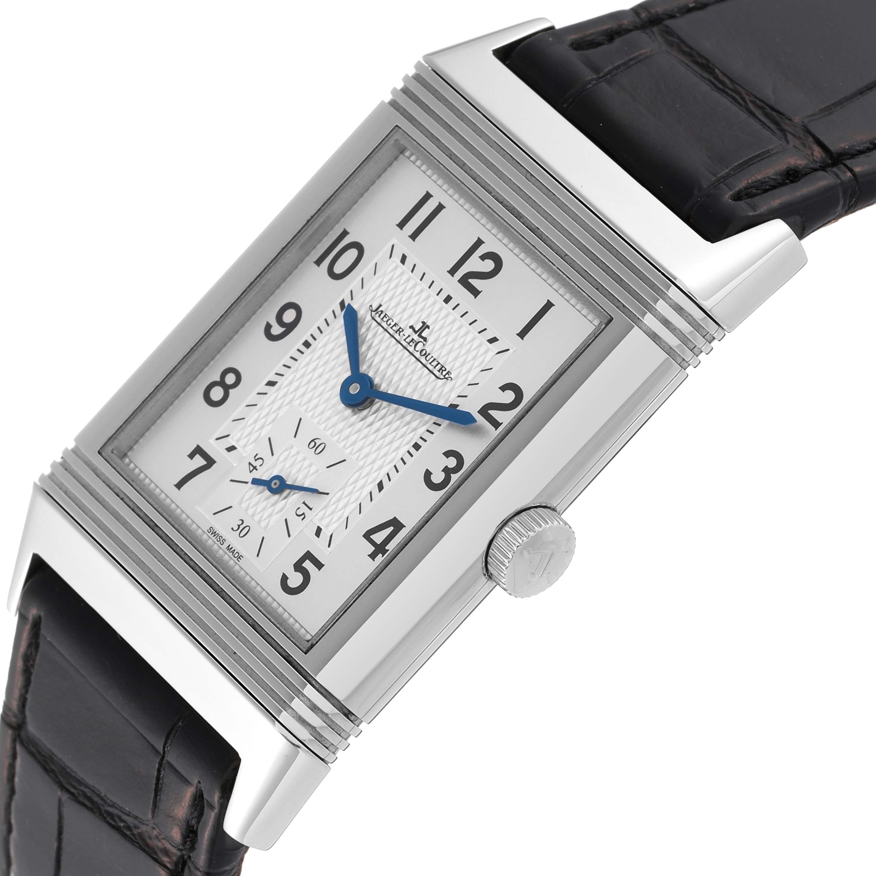 The image shows a close-up view of the Jaeger-LeCoultre Reverso watch, highlighting its dial, case, crown, and leather strap.