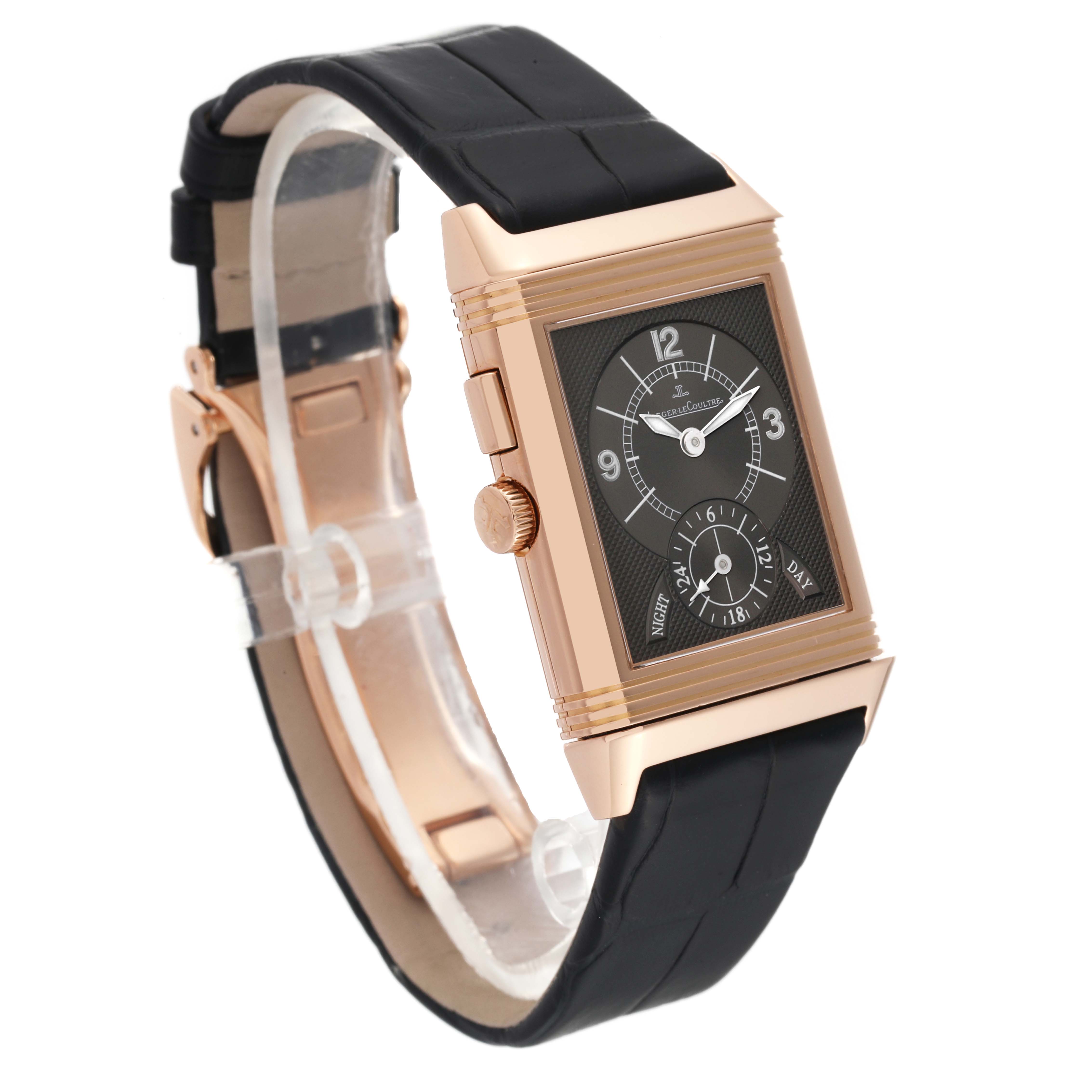 The watch, a Jaeger LeCoultre Reverso Q2712410 Men
s Rose Gold Silver Dial Q2712410 Men
s Rose Gold Silver Dial model, is shown at a three-quarter angle emphasizing its face, side, and strap.