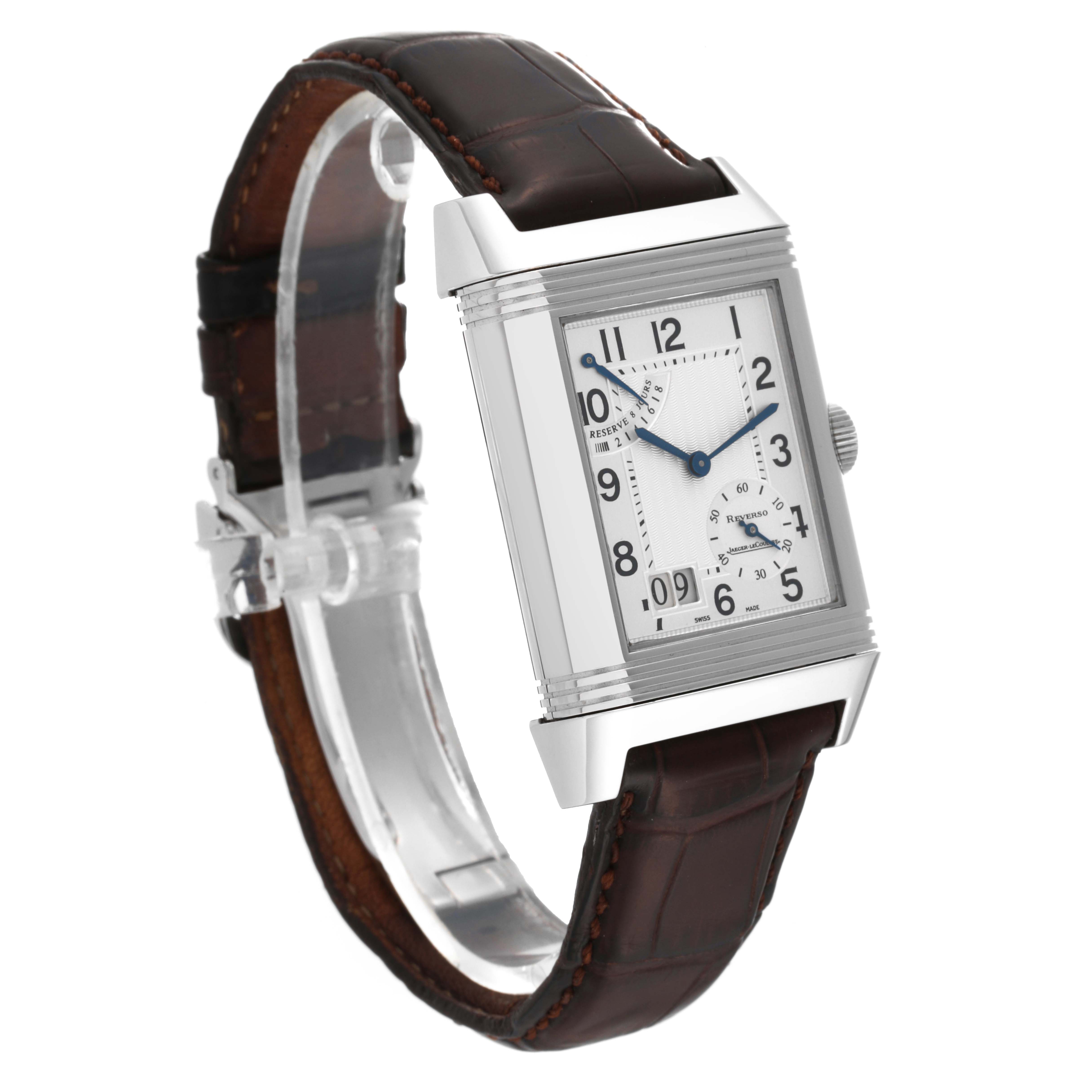 This Jaeger-LeCoultre Reverso watch is viewed from an angle showing the front face and brown leather strap.
