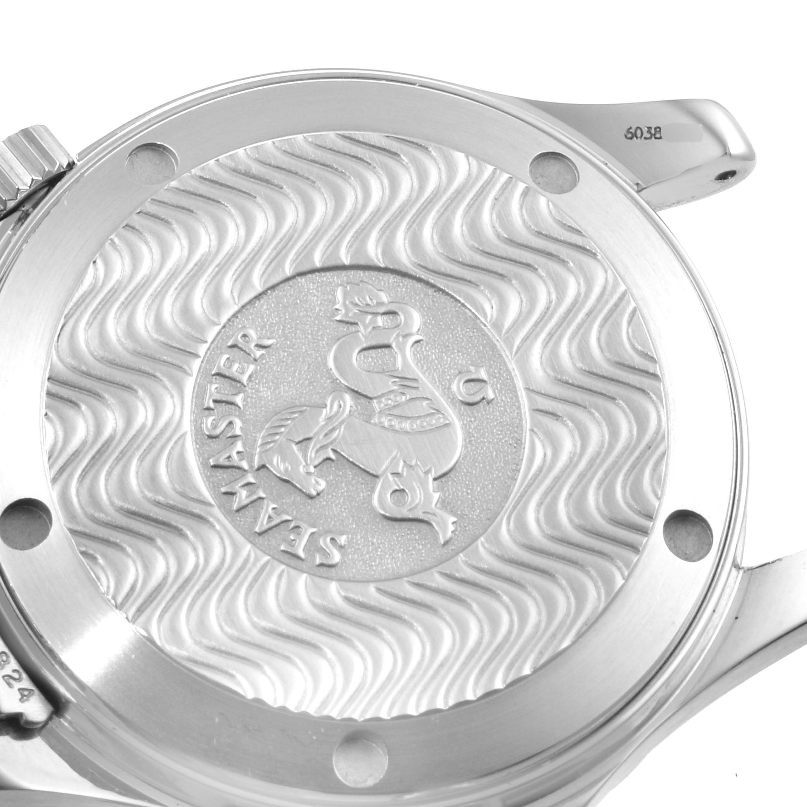 This image shows the case back of the Omega Seamaster 2551.80.00 Men
s Stainless Steel Blue Dial 2551.80.00 Men
s Stainless Steel Blue Dial watch, highlighting its engraved wave pattern and emblem.