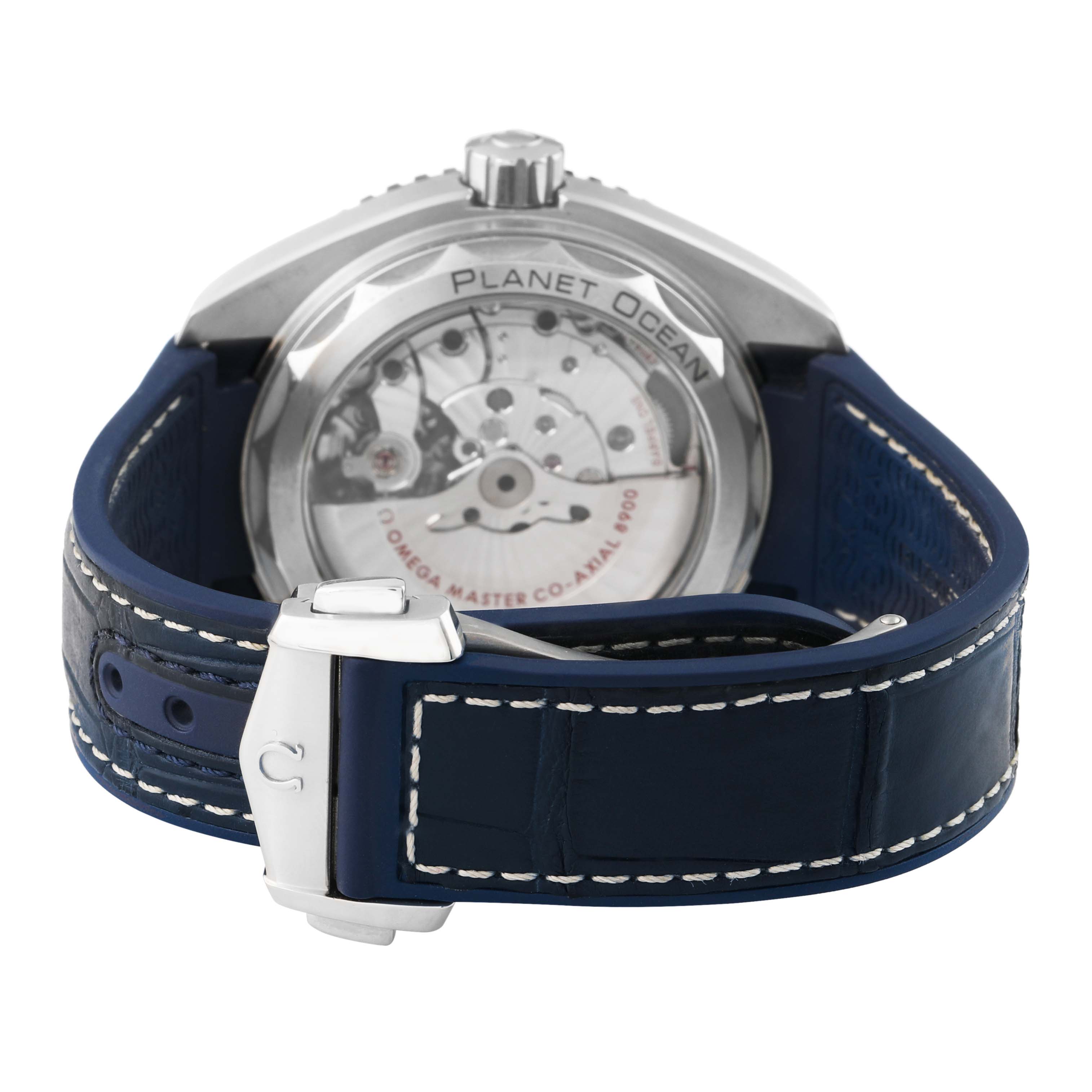 The image shows the back view of the Omega Planet Ocean 215.33.44.21.03.001 Men's Stainless Steel Blue Dial watch, highlighting the case back and blue strap with clasp.