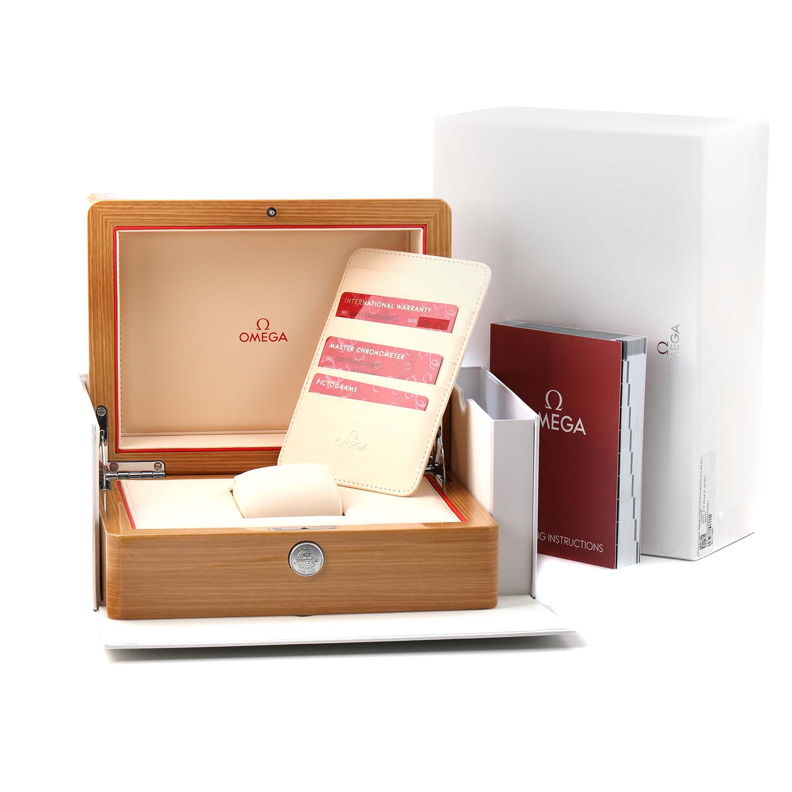 The image shows an Omega Planet Ocean 215.33.44.21.03.001 Men's Stainless Steel Blue Dial watch box, warranty cards, and an instruction manual from a front angle.