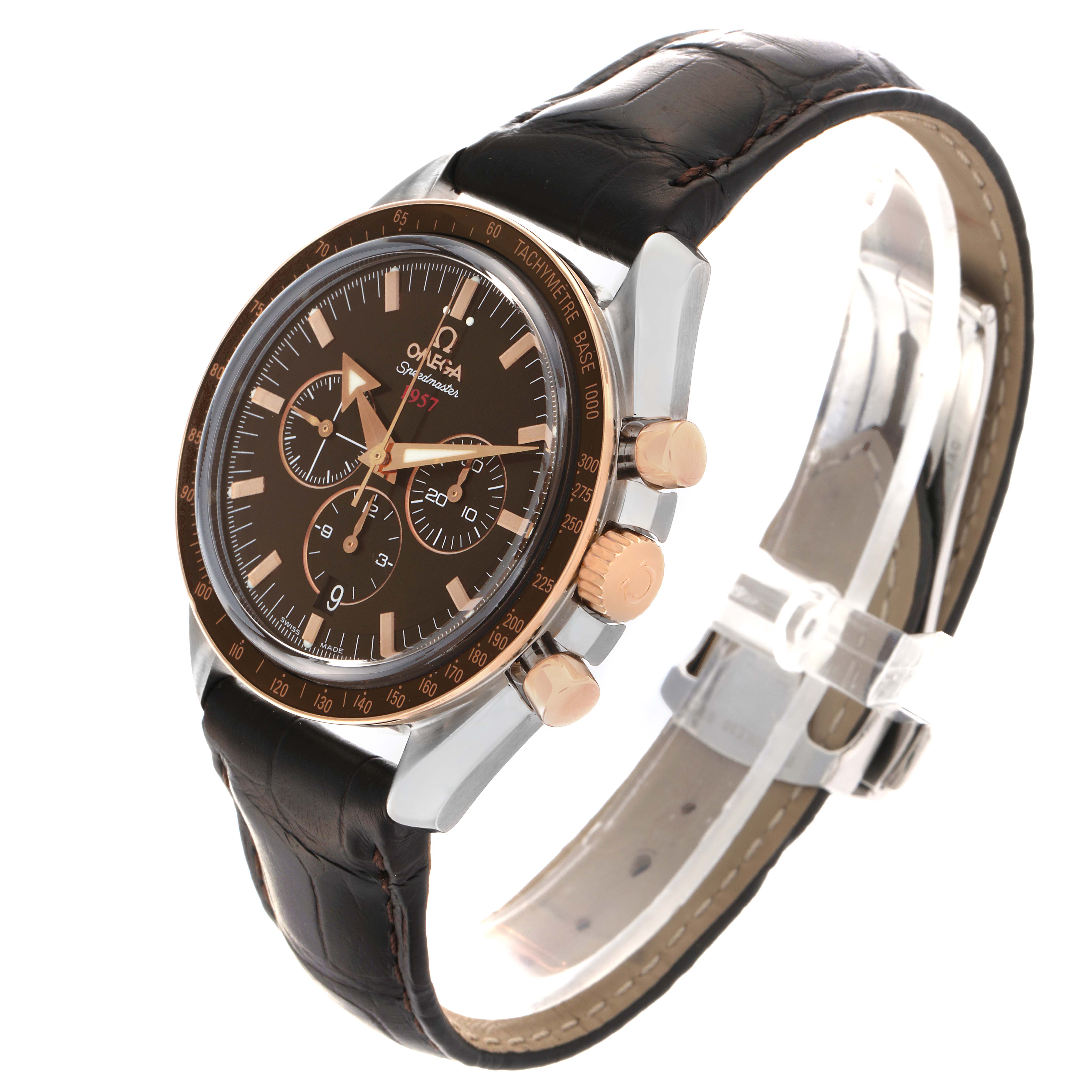 The Omega Speedmaster 321.93.42.50.13.001 Men's Steel and Gold (two tone) Brown Dial 321.93.42.50.13.001 Men's Steel and Gold (two tone) Brown Dial watch is shown at a three-quarter angle, revealing its face, bezel, crown, pushers, and leather strap.