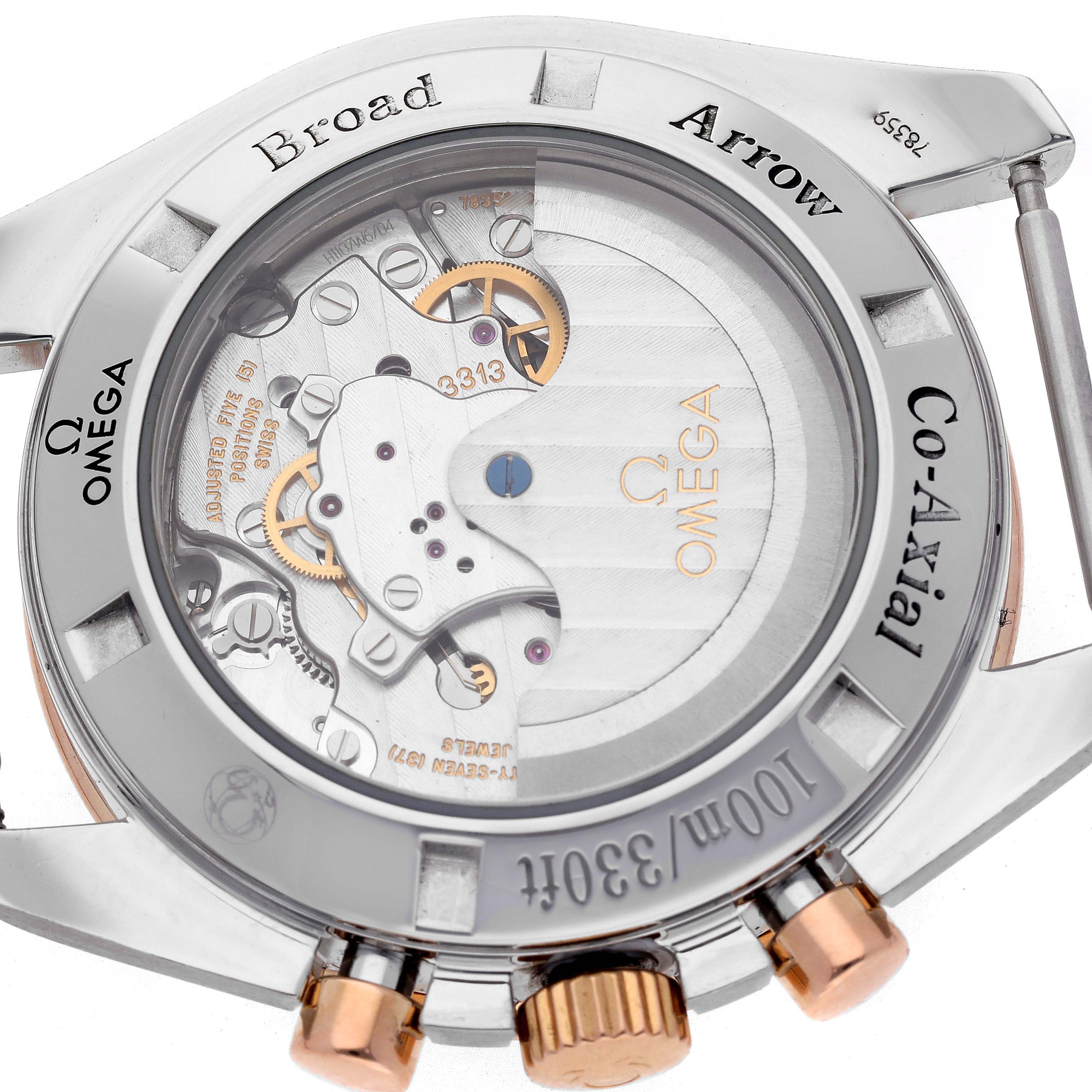 The Omega Speedmaster 321.93.42.50.13.001 Men's Steel and Gold (two tone) Brown Dial 321.93.42.50.13.001 Men's Steel and Gold (two tone) Brown Dial is shown from the back, displaying its movement, bezel engravings, and pushers.