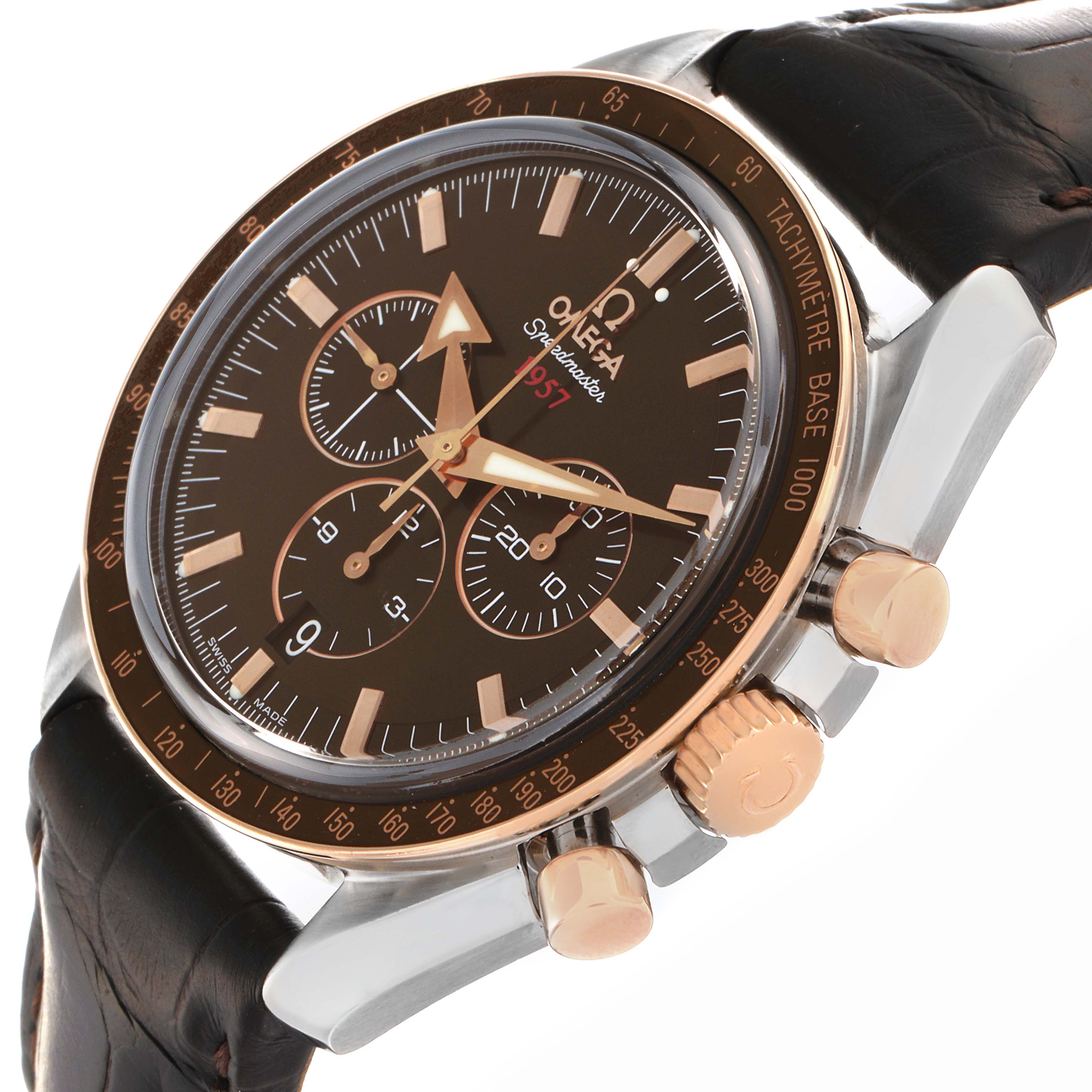 The Omega Speedmaster 321.93.42.50.13.001 Men's Steel and Gold (two tone) Brown Dial 321.93.42.50.13.001 Men's Steel and Gold (two tone) Brown Dial watch is shown at an angled view highlighting the dial, bezel, crown, pushers, and leather strap.