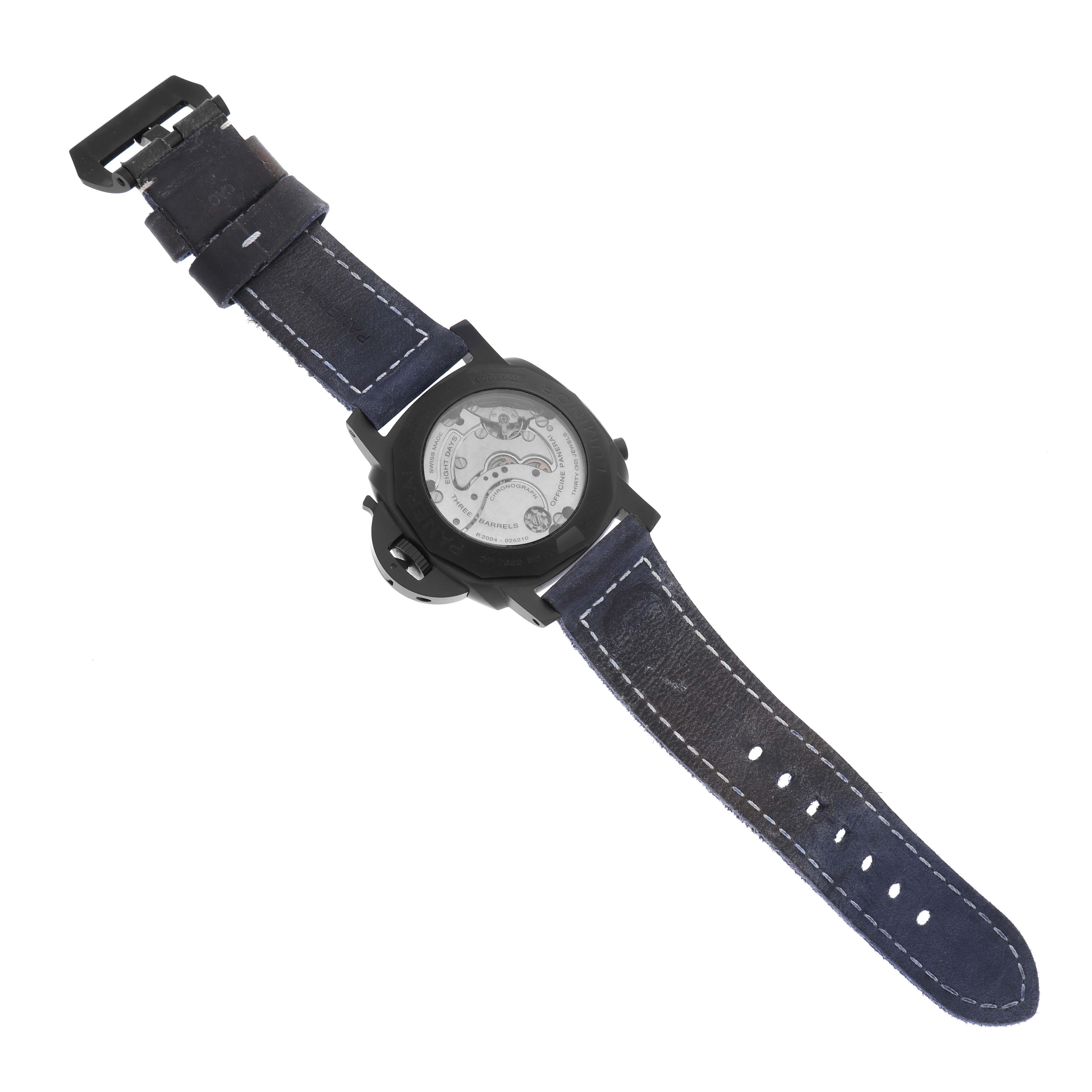 The image shows a Panerai Luminor PAM01135 Men's Titanium Blue Dial PAM01135 Men's Titanium Blue Dial watch from the back, displaying the movement and strap with visible stitching.