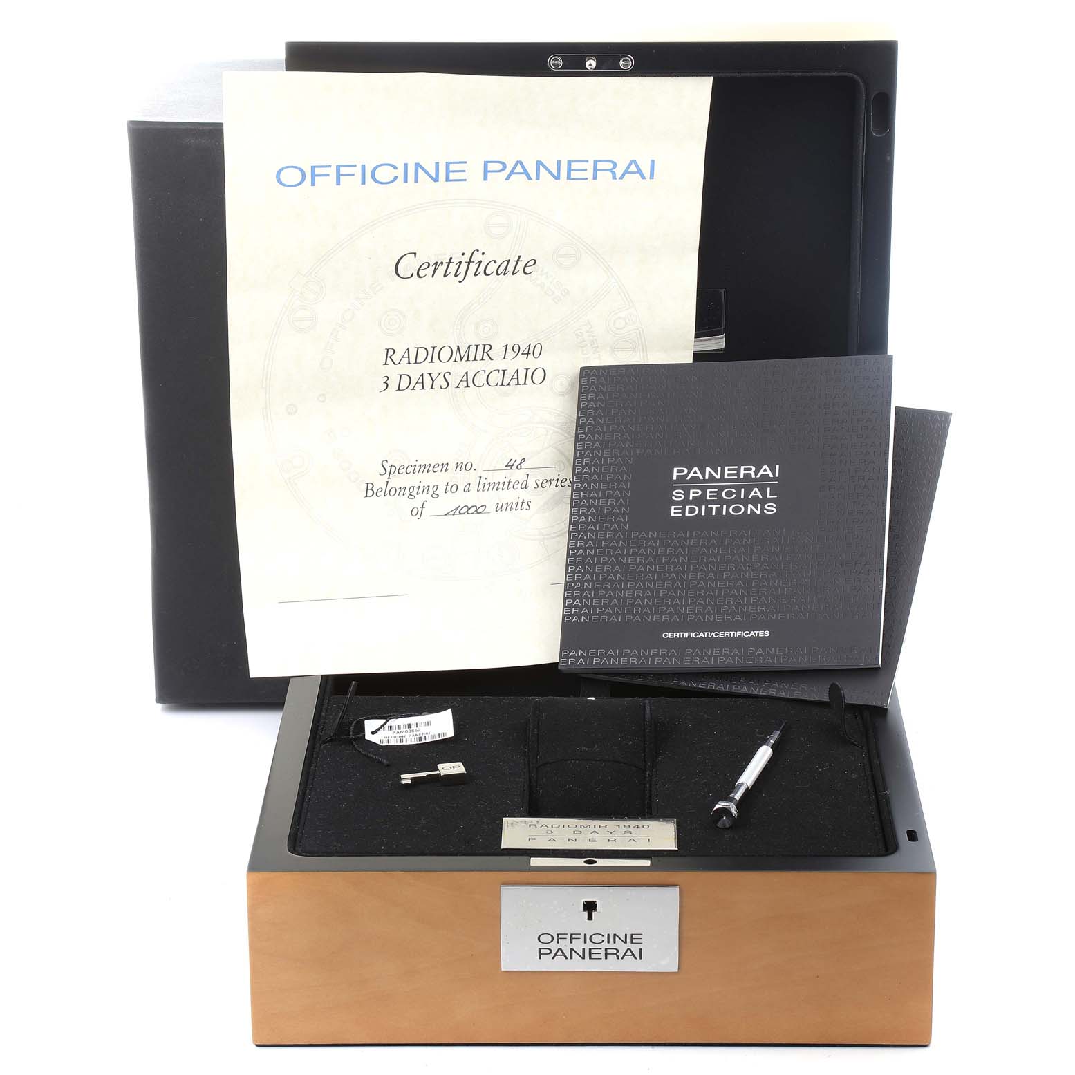 This image shows a Panerai Radiomir PAM00662 Men's Stainless Steel Brown Dial PAM00662 Men's Stainless Steel Brown Dial watch box and accessories including certificates and a tool from a frontal angle.