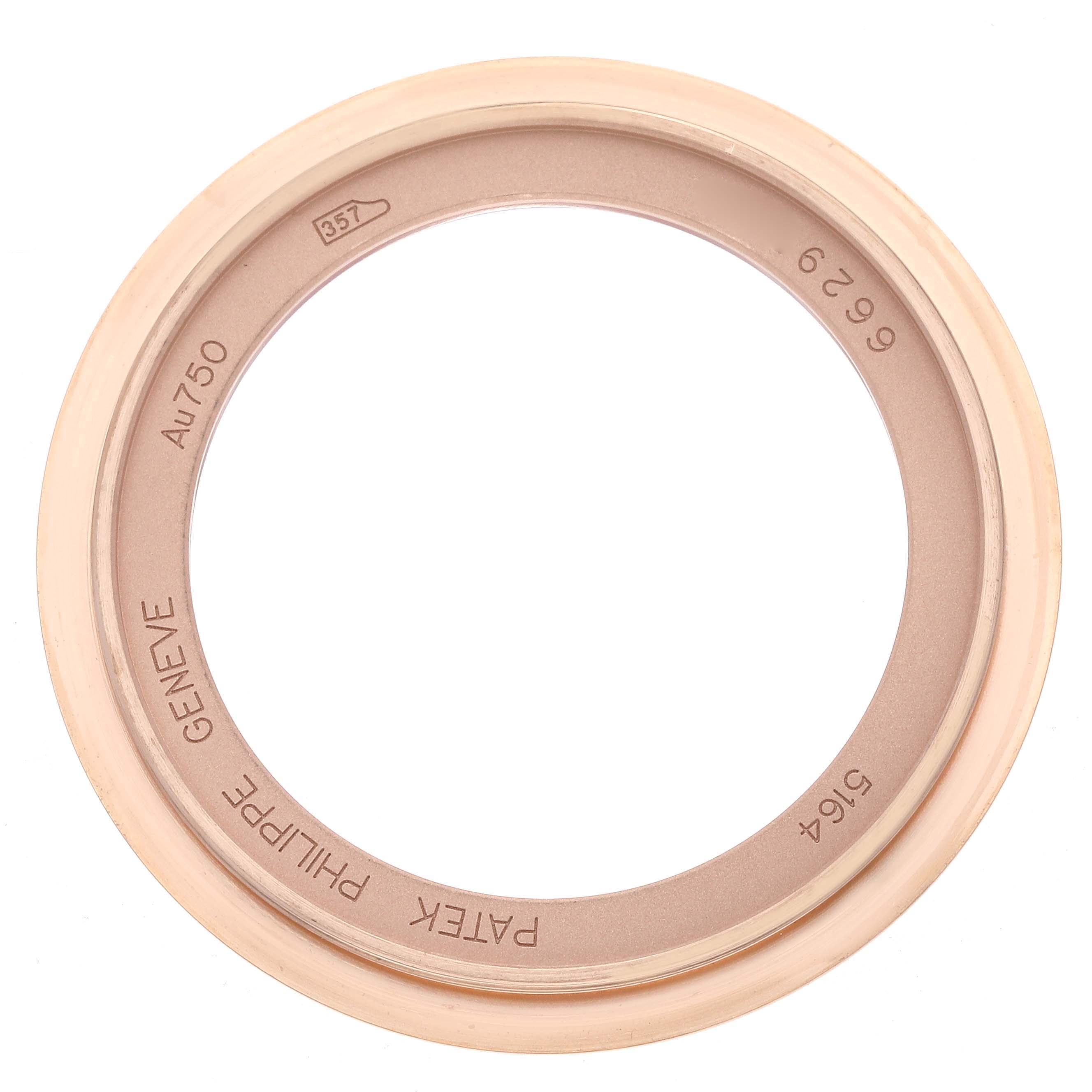 This image shows a bezel for the Patek Philippe Aquanaut 5164R Men's Rose Gold Brown Dial 5164R Men's Rose Gold Brown Dial watch, featuring engravings viewed from above.