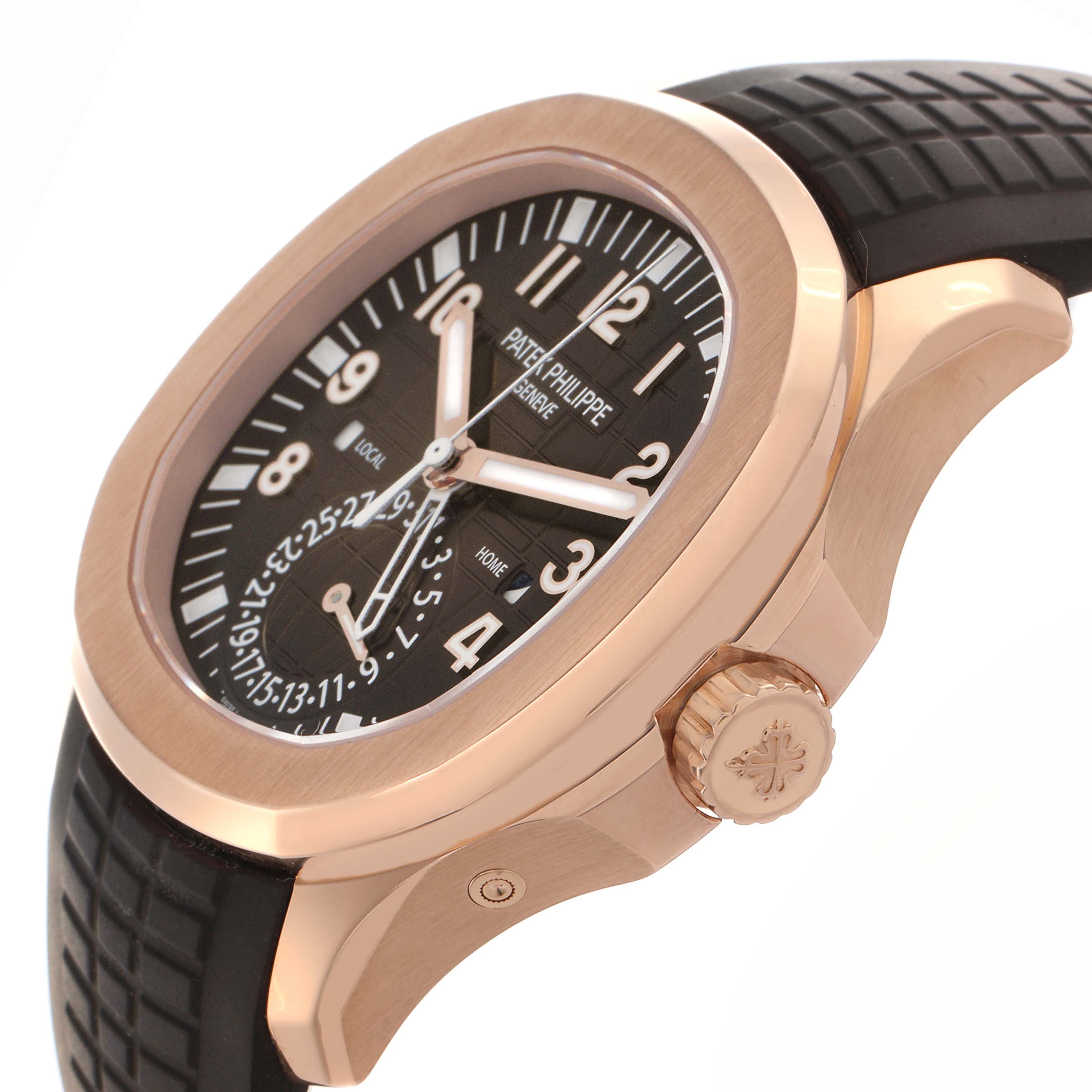 The Patek Philippe Aquanaut 5164R Men's Rose Gold Brown Dial 5164R Men's Rose Gold Brown Dial watch is shown from a side angle, highlighting the dial, case, crown, and part of the strap.