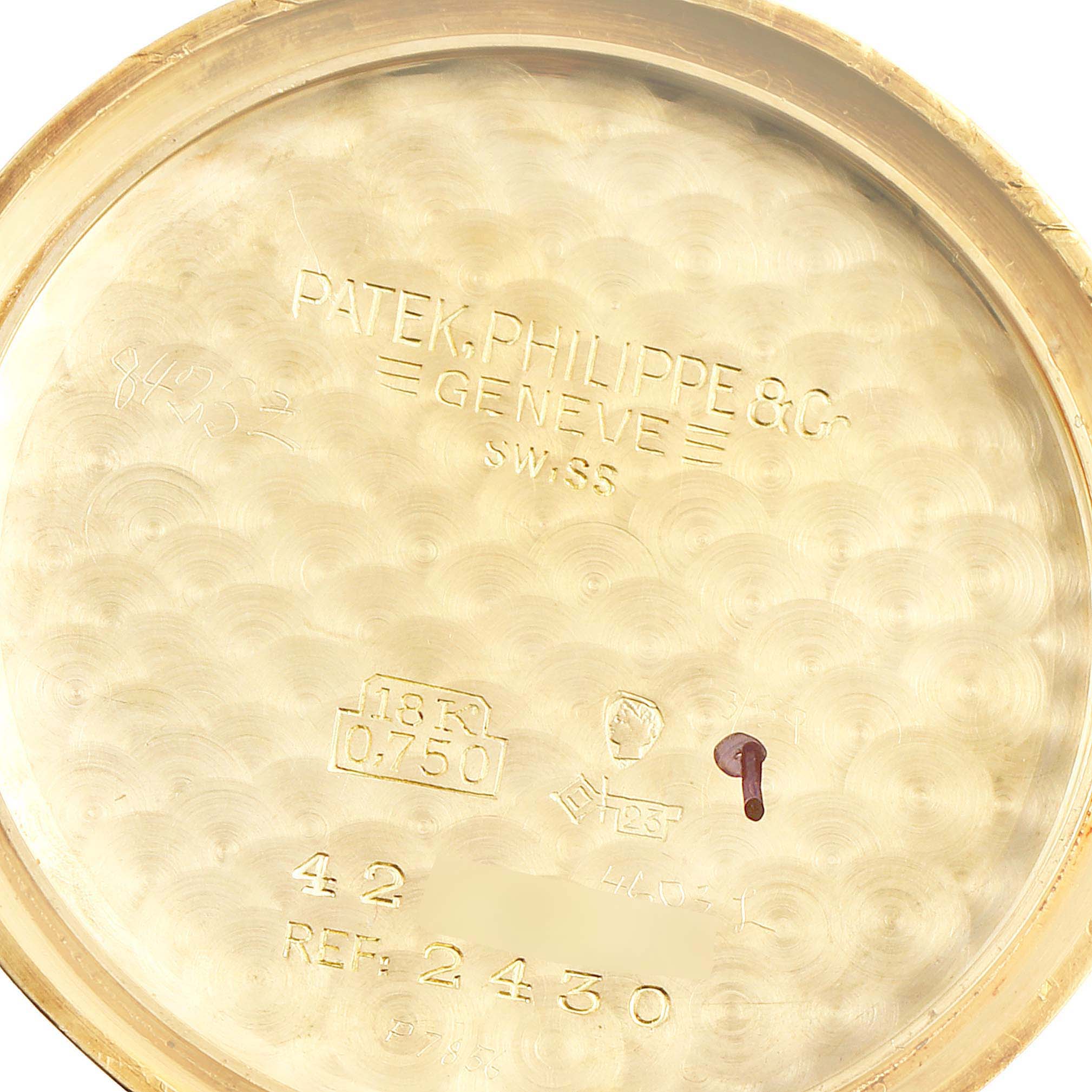 This image shows the inside back case of a vintage Patek Philippe watch model Ref. 2430.