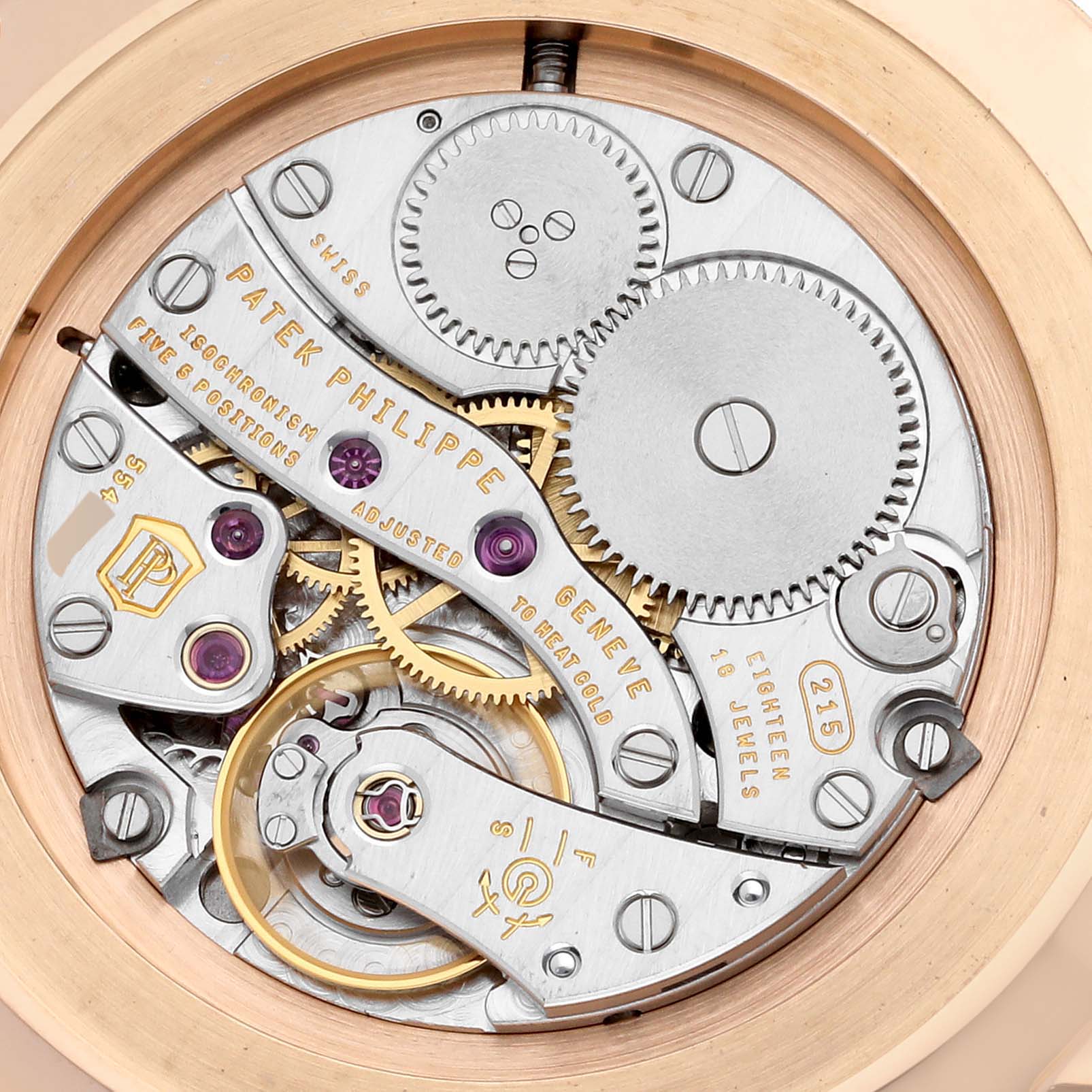 This image shows the intricate inner movement and mechanics of a Patek Philippe Calatrava 5119R Men's Rose Gold White Dial 5119R Men's Rose Gold White Dial watch, viewed from the back.