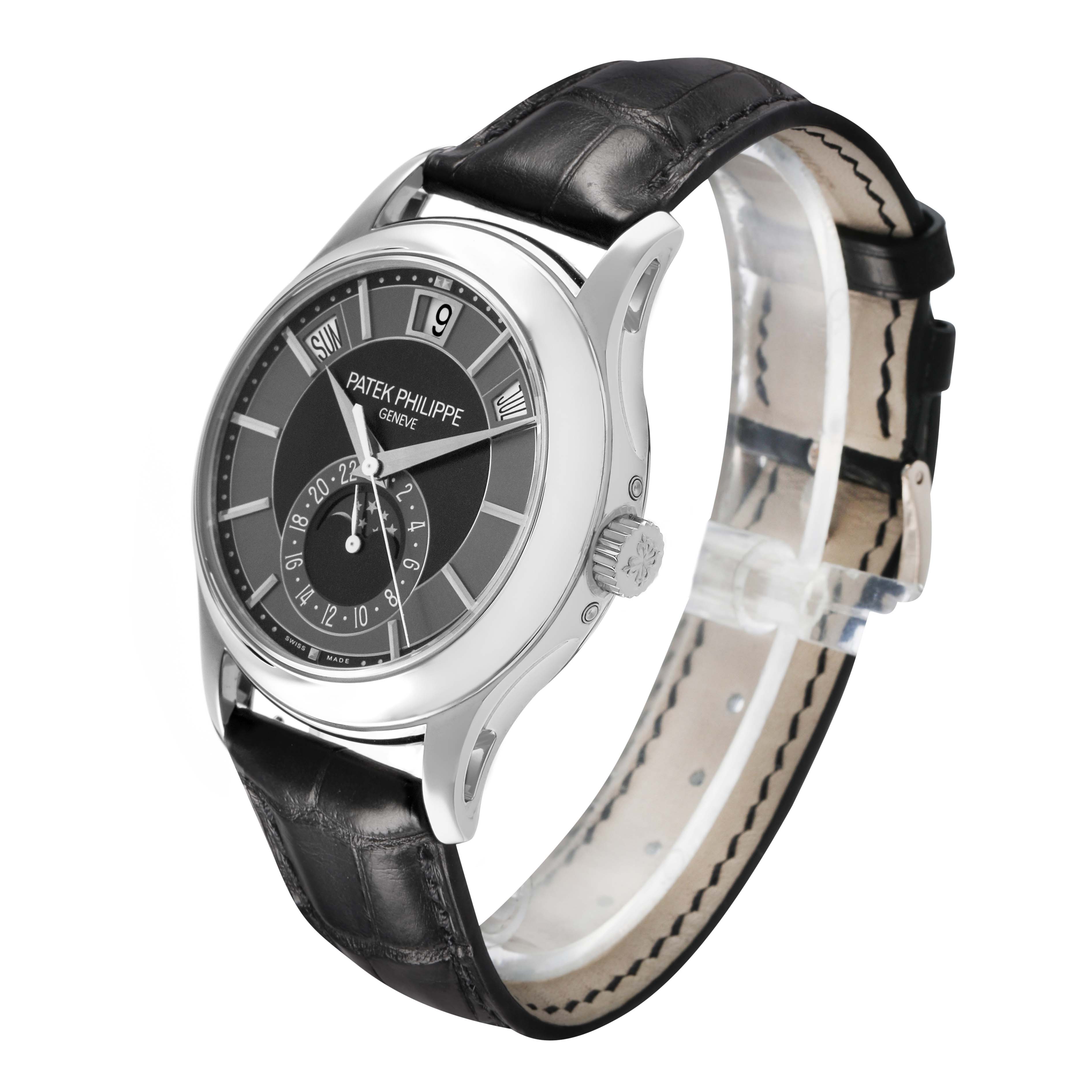 The Patek Philippe Complications 5205G-010 Men's White Gold Grey Dial watch is shown at an angled view, highlighting the dial, case, and leather strap.