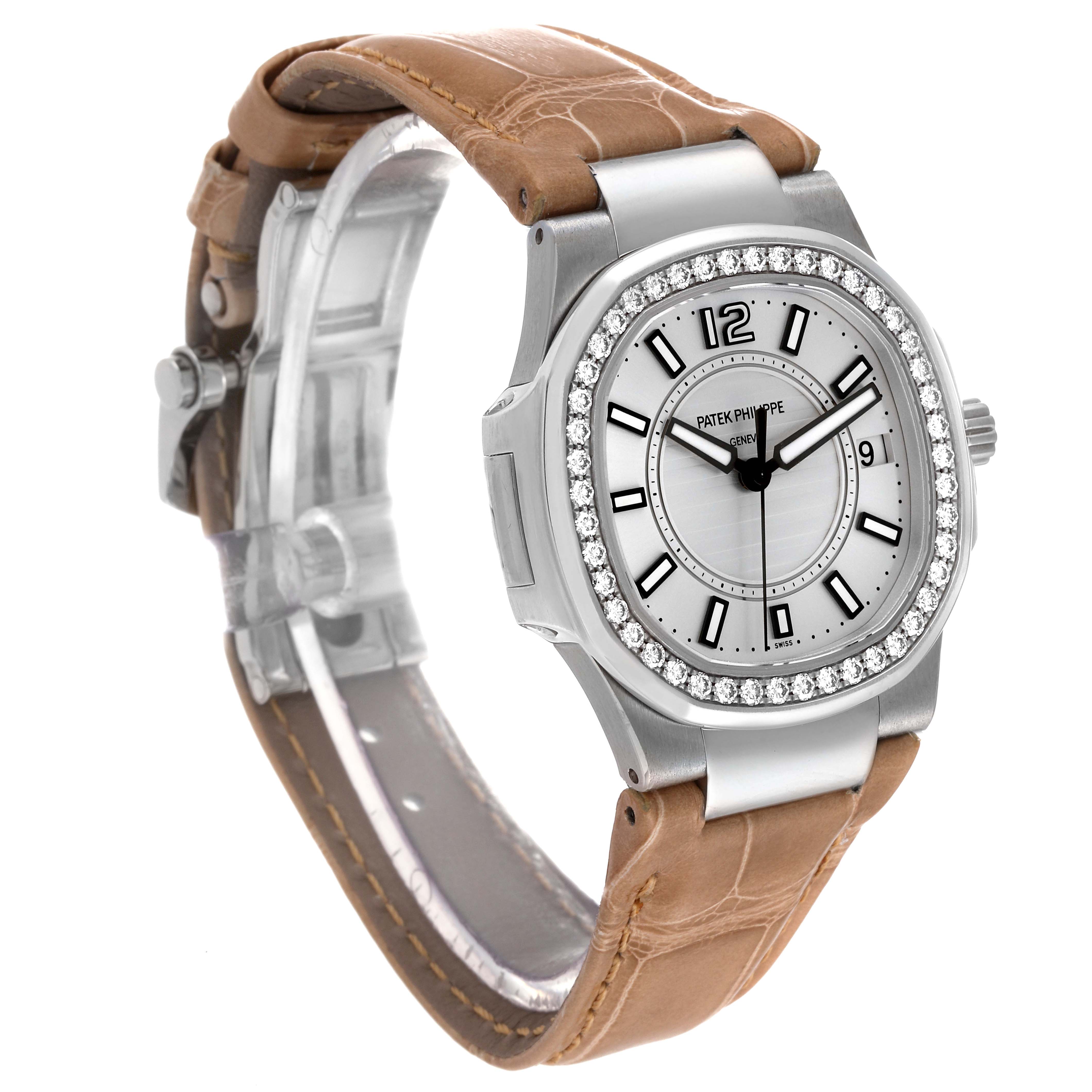 The image shows a Patek Philippe Nautilus 7010G Women's White Gold Silver Dial 7010G Women's White Gold Silver Dial watch from a front angled view, highlighting its dial, bezel, and strap.