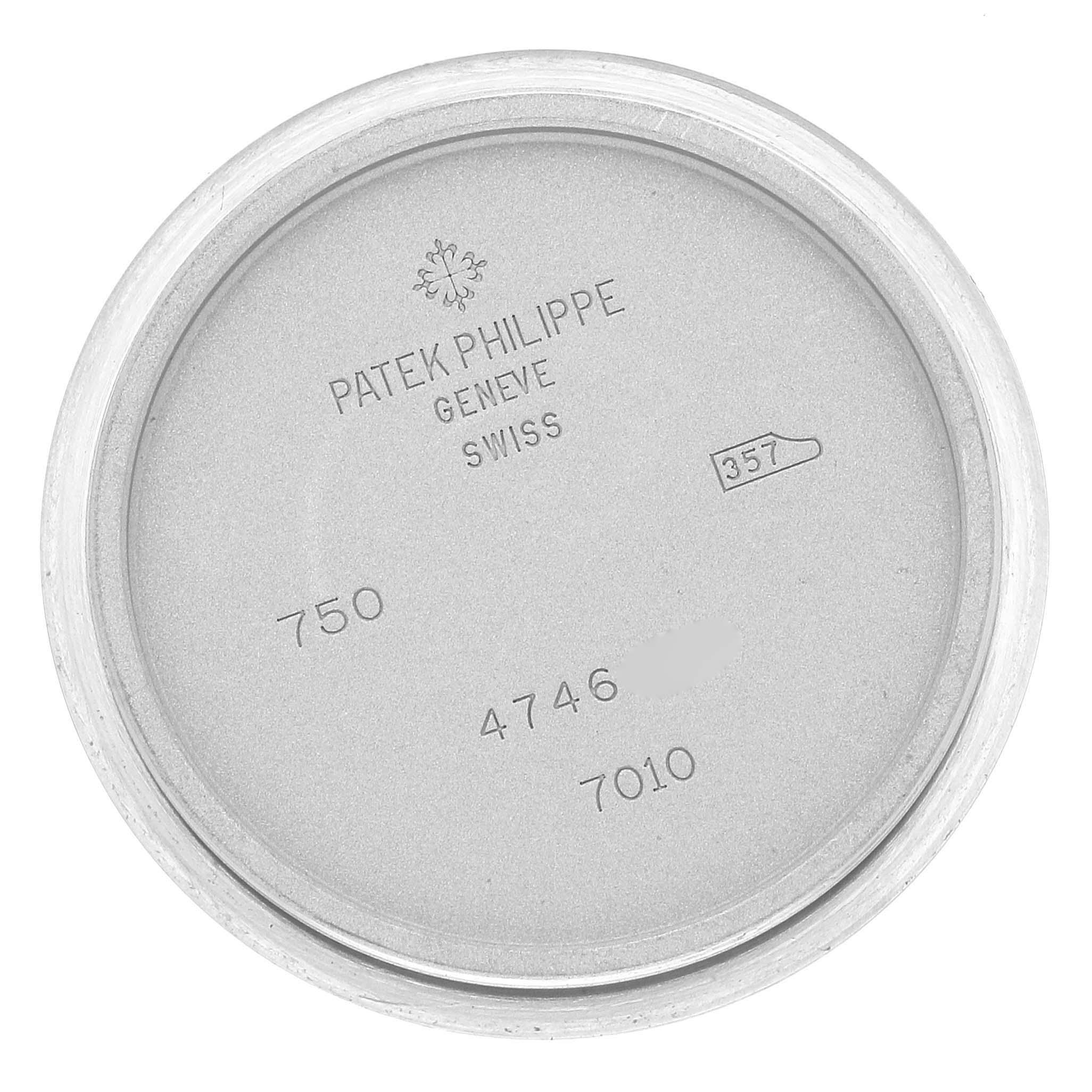 This image shows the inner case back of a Patek Philippe Nautilus 7010G Women's White Gold Silver Dial 7010G Women's White Gold Silver Dial watch, with model details engraved.