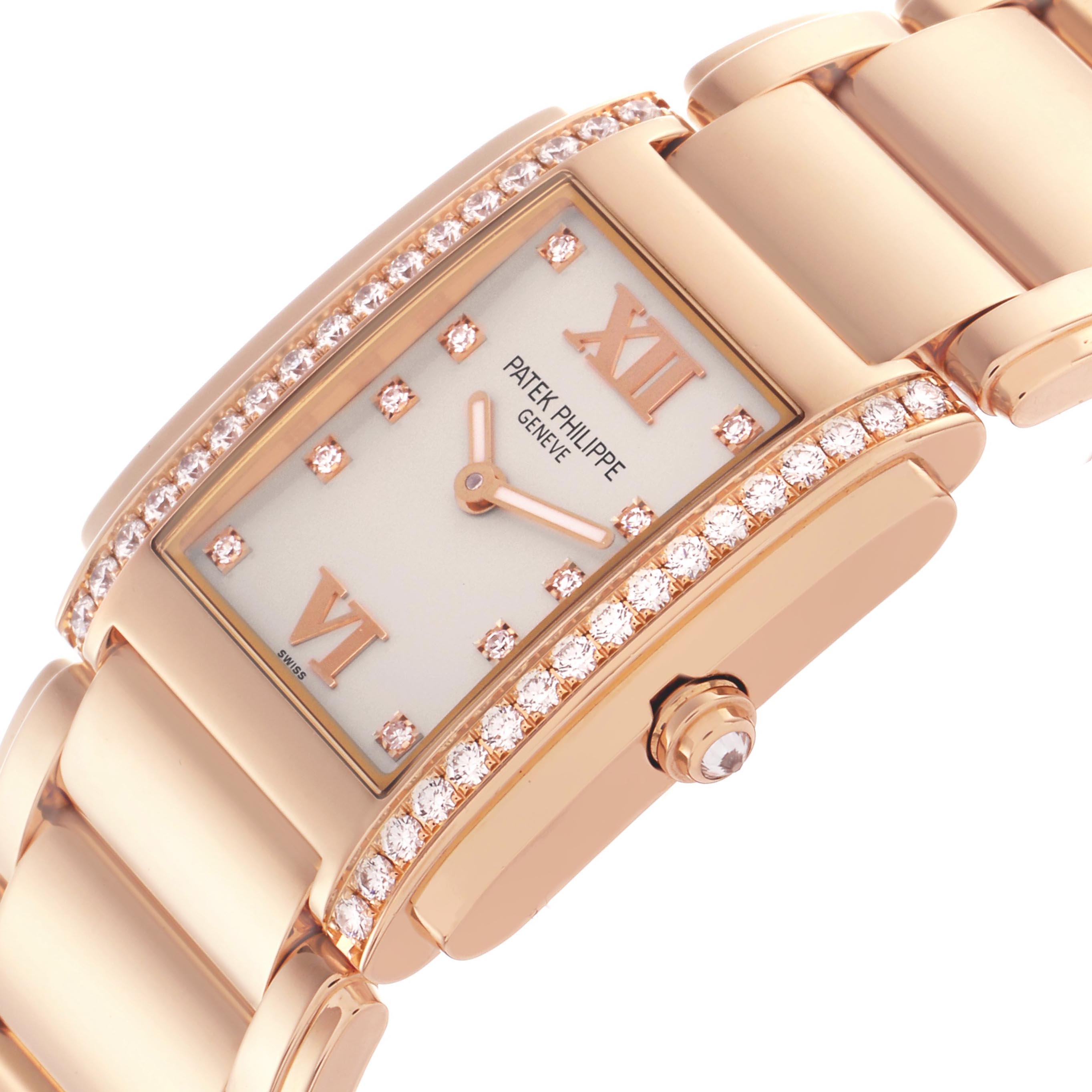 The Patek Philippe Twenty-4 4910/11R-011 Women's Rose Gold Silver Dial 4910/11R-011 Women's Rose Gold Silver Dial watch is shown at an angled side view, highlighting its diamond-encrusted bezel and bracelet.
