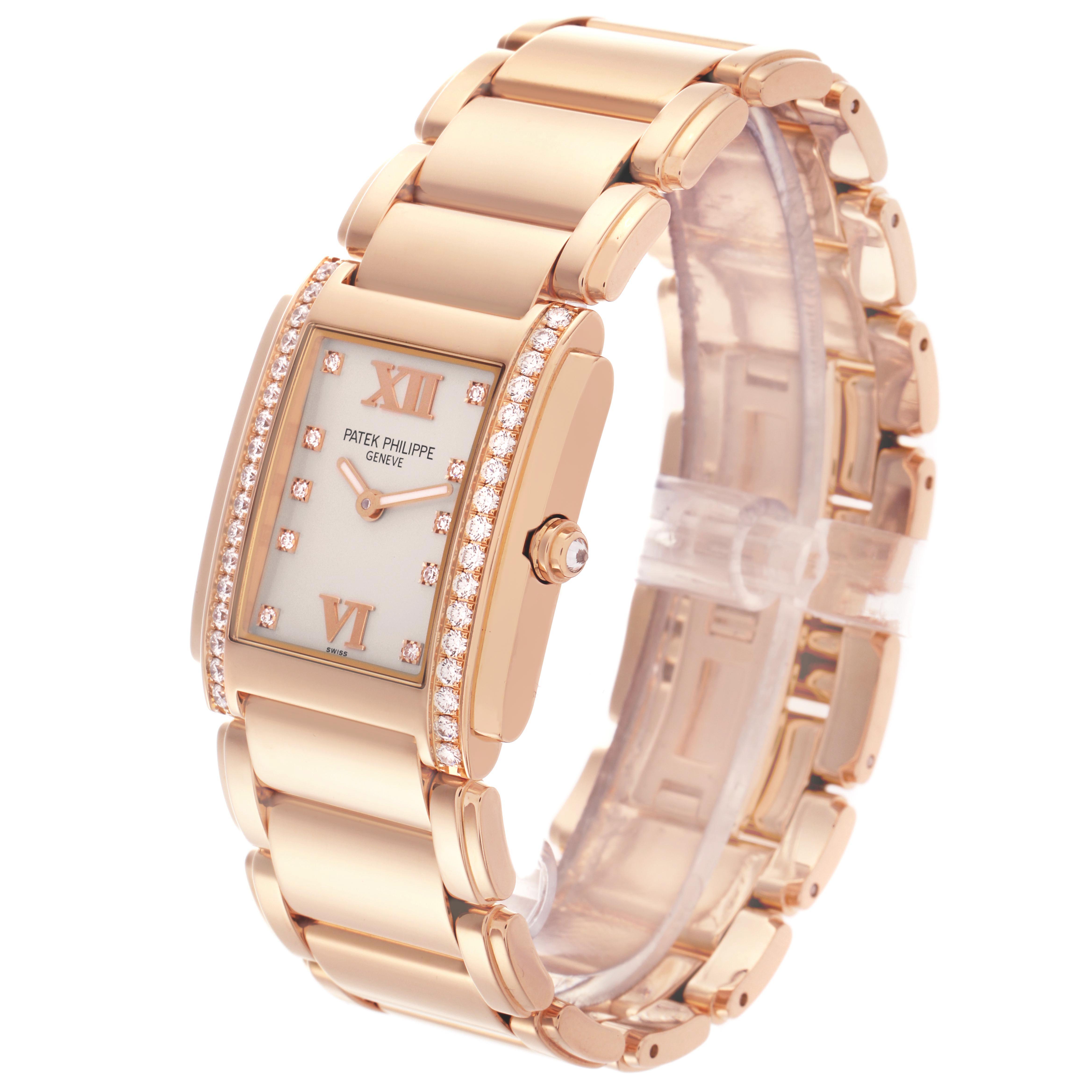 The Patek Philippe Twenty-4 4910/11R-011 Women's Rose Gold Silver Dial 4910/11R-011 Women's Rose Gold Silver Dial watch is shown at an angled view, highlighting its face, diamond-set bezel, and bracelet.