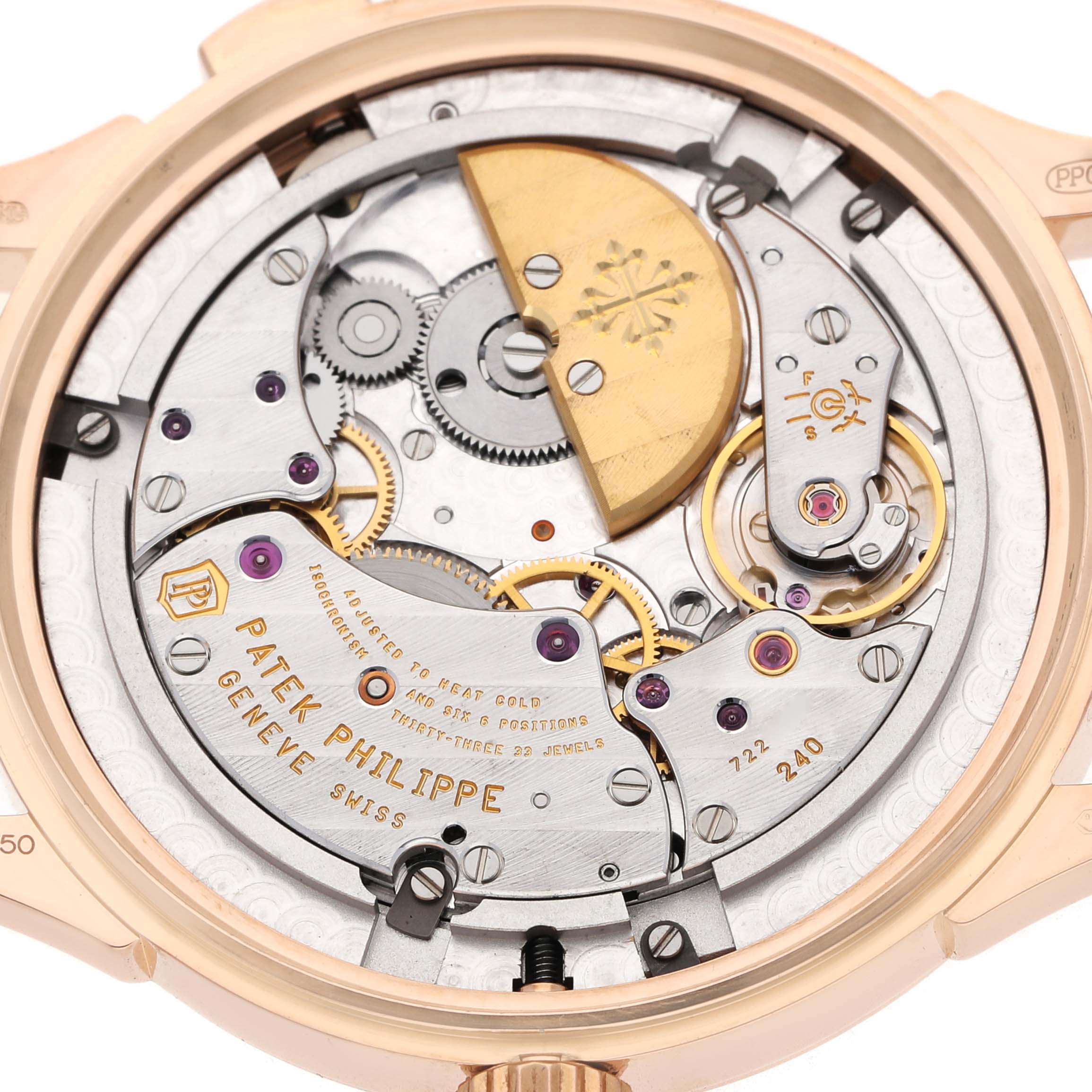 The image shows the movement of the Patek Philippe Complications 5230R-001 Men's Rose Gold Grey Dial watch from a rear view angle, highlighting intricate components.
