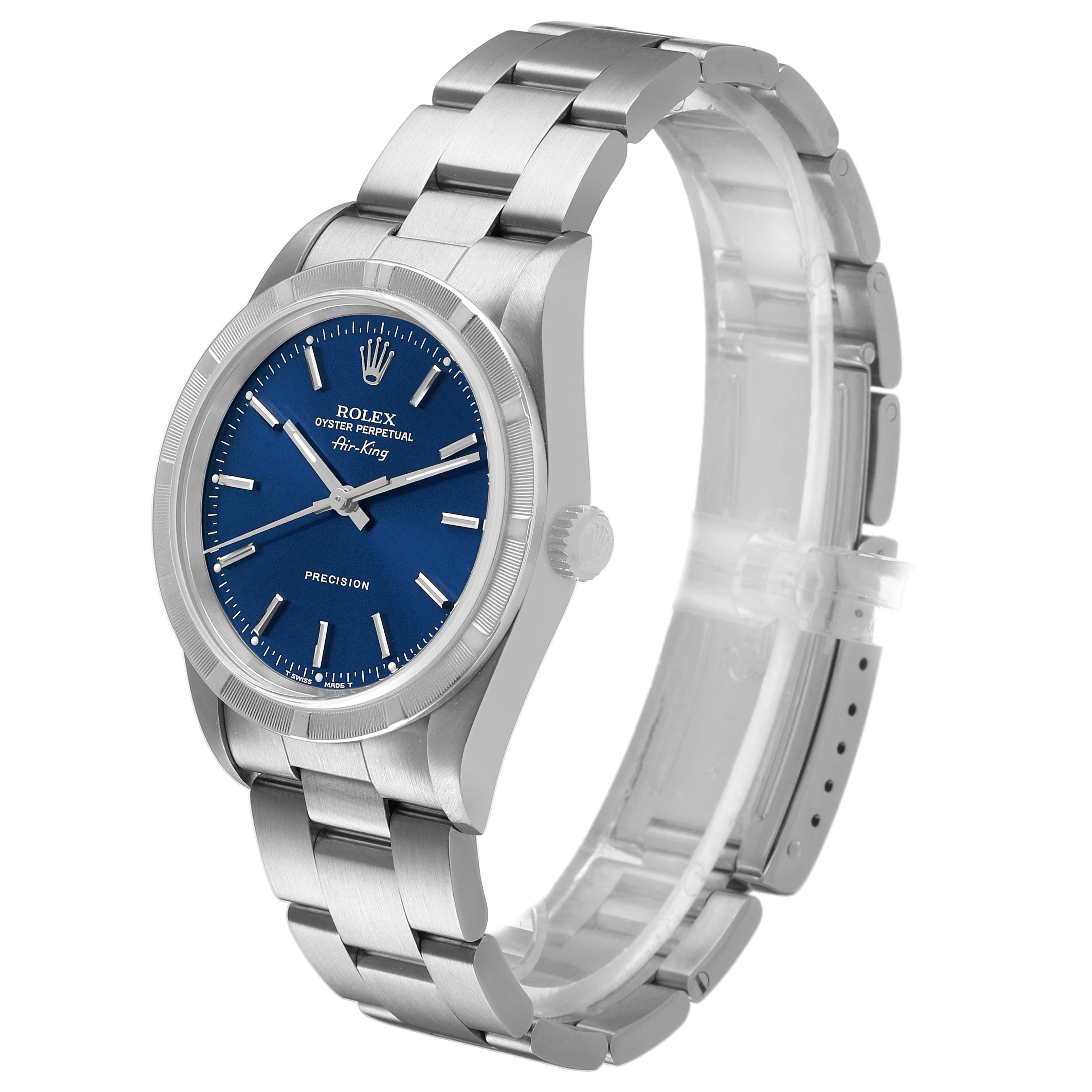 The image shows a Rolex Air-King 14010 Men's Stainless Steel Blue Dial watch at a three-quarter angle highlighting the face, bezel, crown, and part of the bracelet.