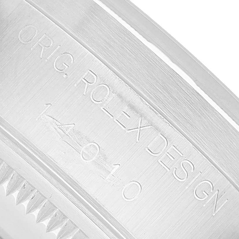 The image shows an angled close-up of the engraving on the side of the Rolex Air-King 14010 Men's Stainless Steel Blue Dial watch case, highlighting the model number.
