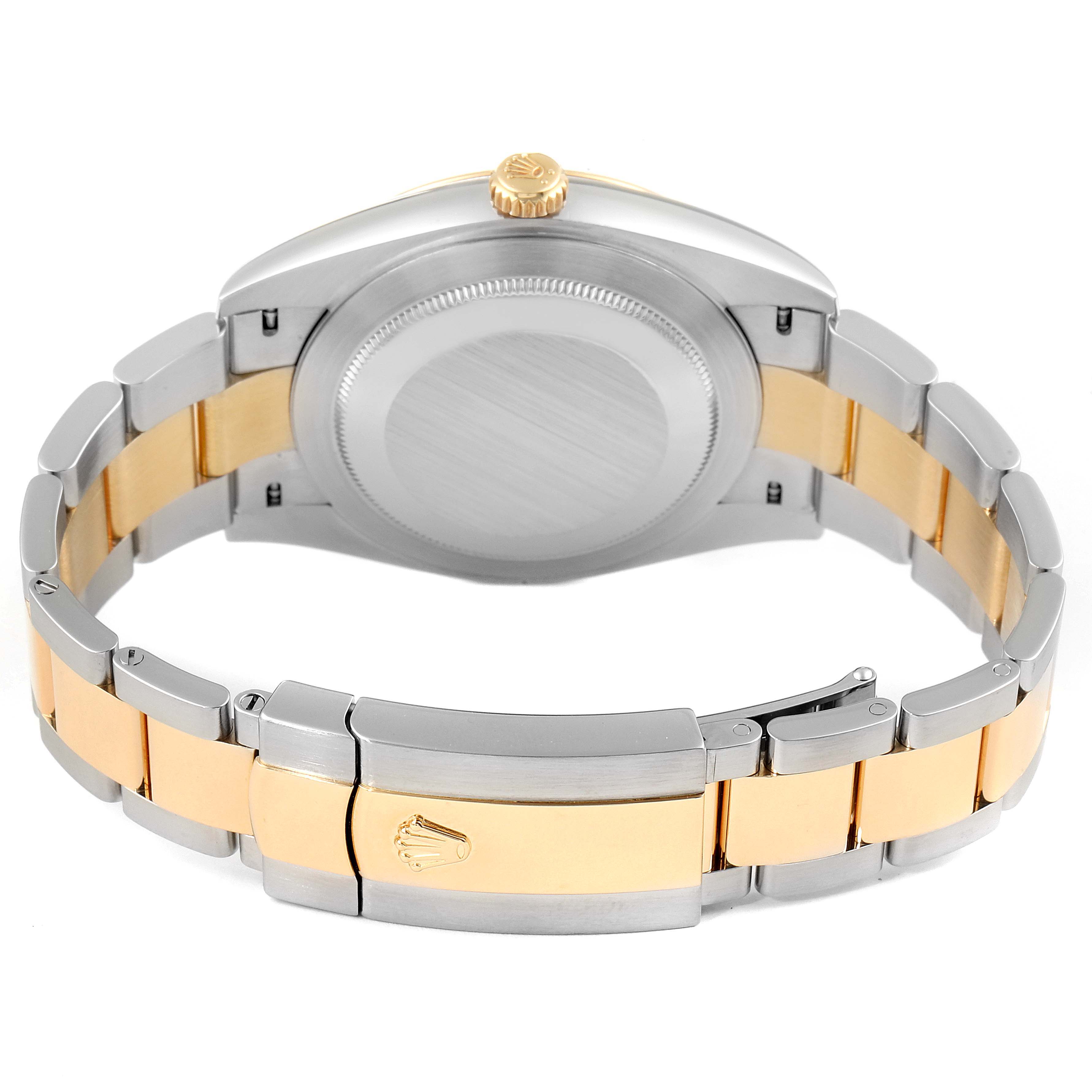 The image shows the backside of a Rolex Datejust 41 126303 Men's Steel and Gold (two tone) Black Dial 126303 Men's Steel and Gold (two tone) Black Dial watch, including the caseback, crown, and two-tone bracelet with a clasp.