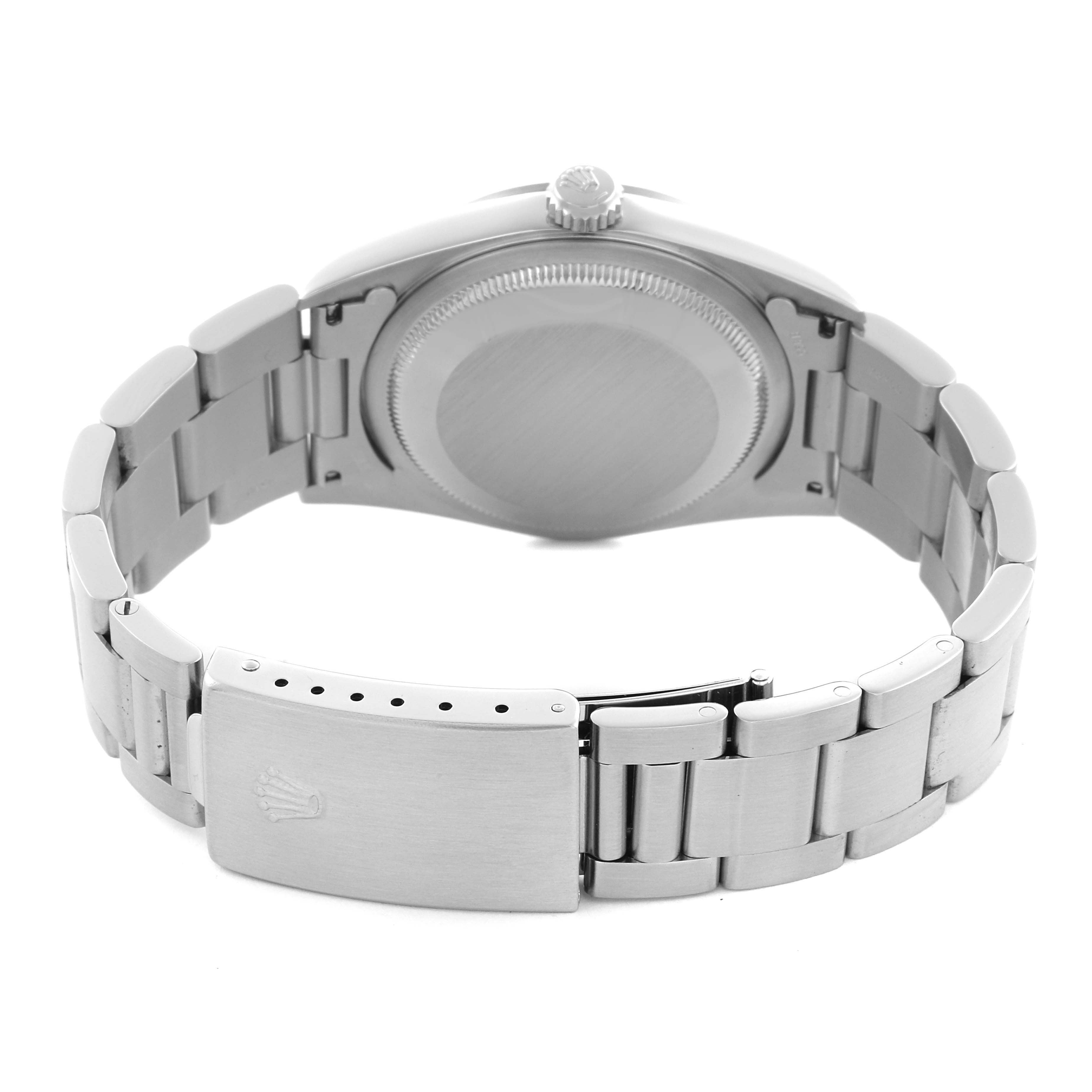 The image shows the backside of a Rolex Datejust 16200 Men's Stainless Steel Blue Dial 16200 Men's Stainless Steel Blue Dial watch, highlighting the clasp, bracelet, and case back.