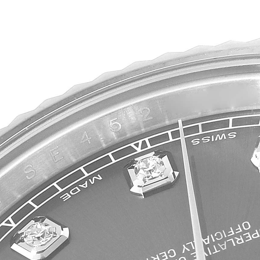 This image shows a partial view of the dial and bezel of a Rolex Datejust 41 116334G Men
s Stainless Steel Grey Dial 116334G Men
s Stainless Steel Grey Dial watch, highlighting the diamond hour markers and text.