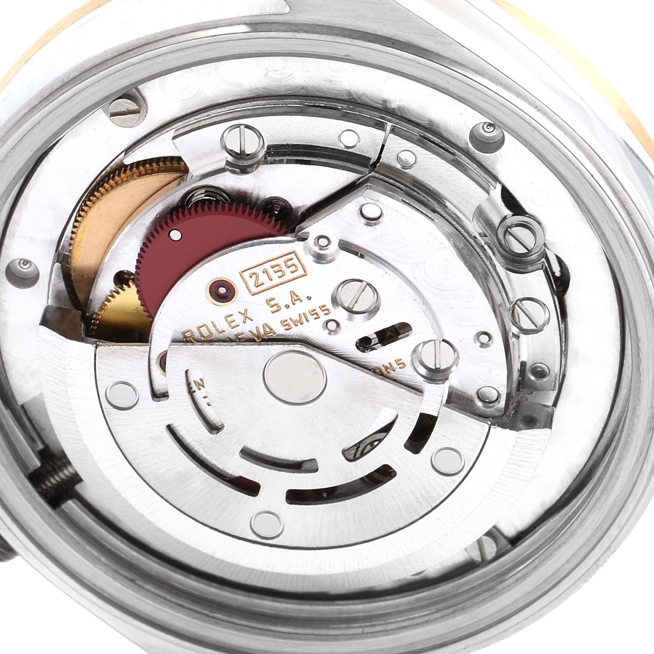 This close-up image shows the internal mechanism and parts of the mid-size Rolex watch model from the back angle.