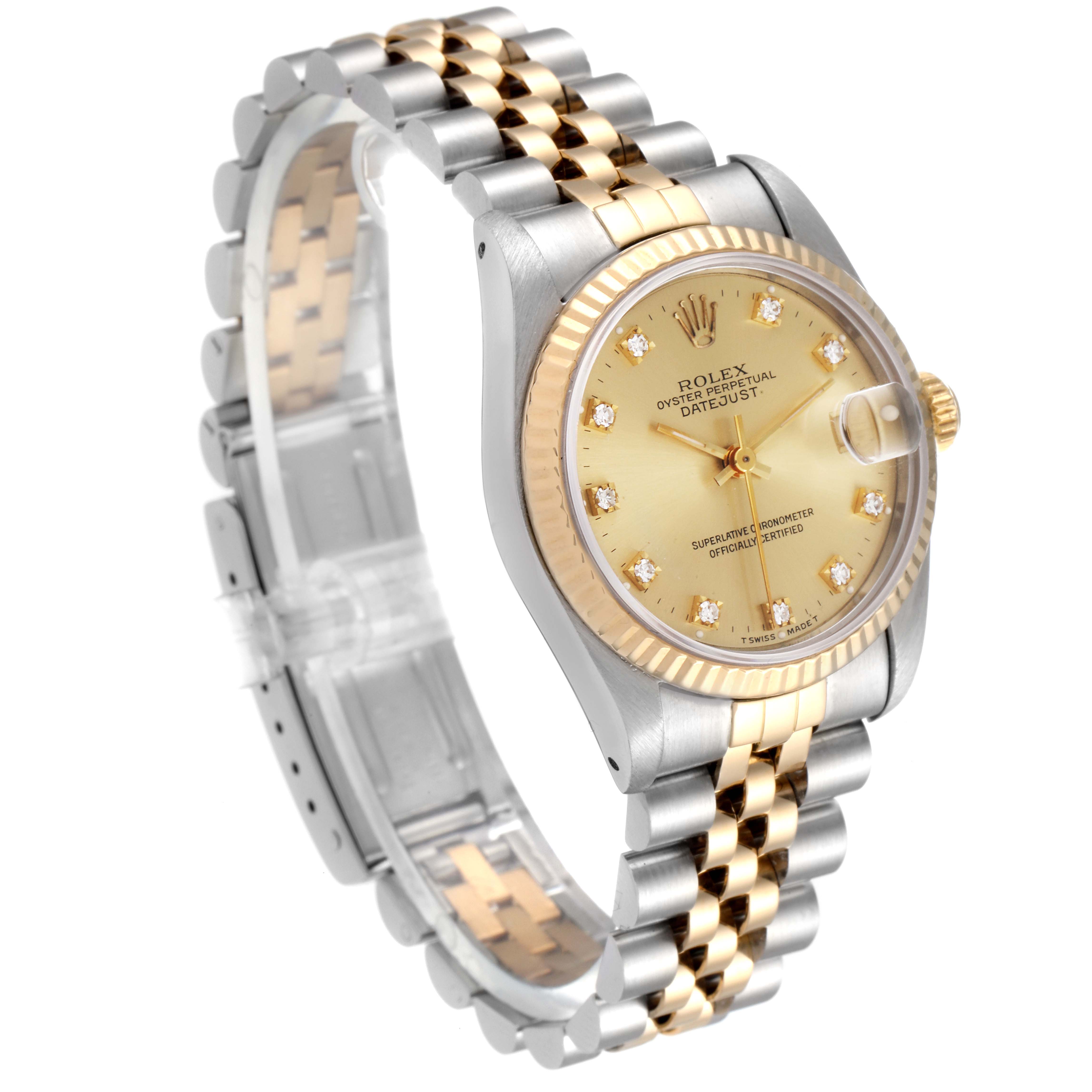 This image shows a Mid-Size Rolex Datejust watch from an oblique angle, highlighting the dial, bezel, and two-tone bracelet.