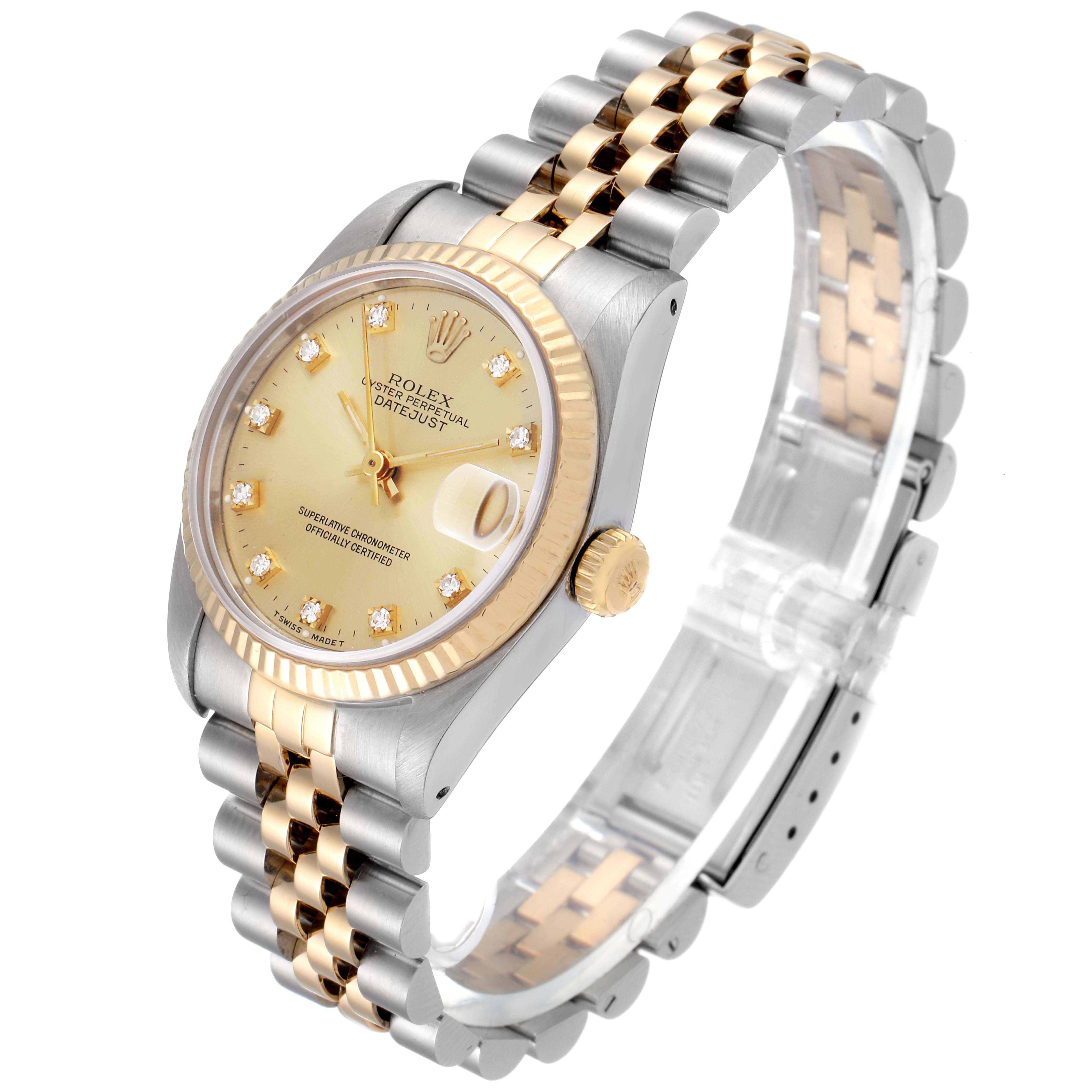 The image shows a Rolex Mid-Size 68273 Women's Steel and Gold (two tone) Champagne Dial 68273 Women's Steel and Gold (two tone) Champagne Dial Datejust watch from an angled side view, highlighting its bezel, dial, crown, and jubilee bracelet.