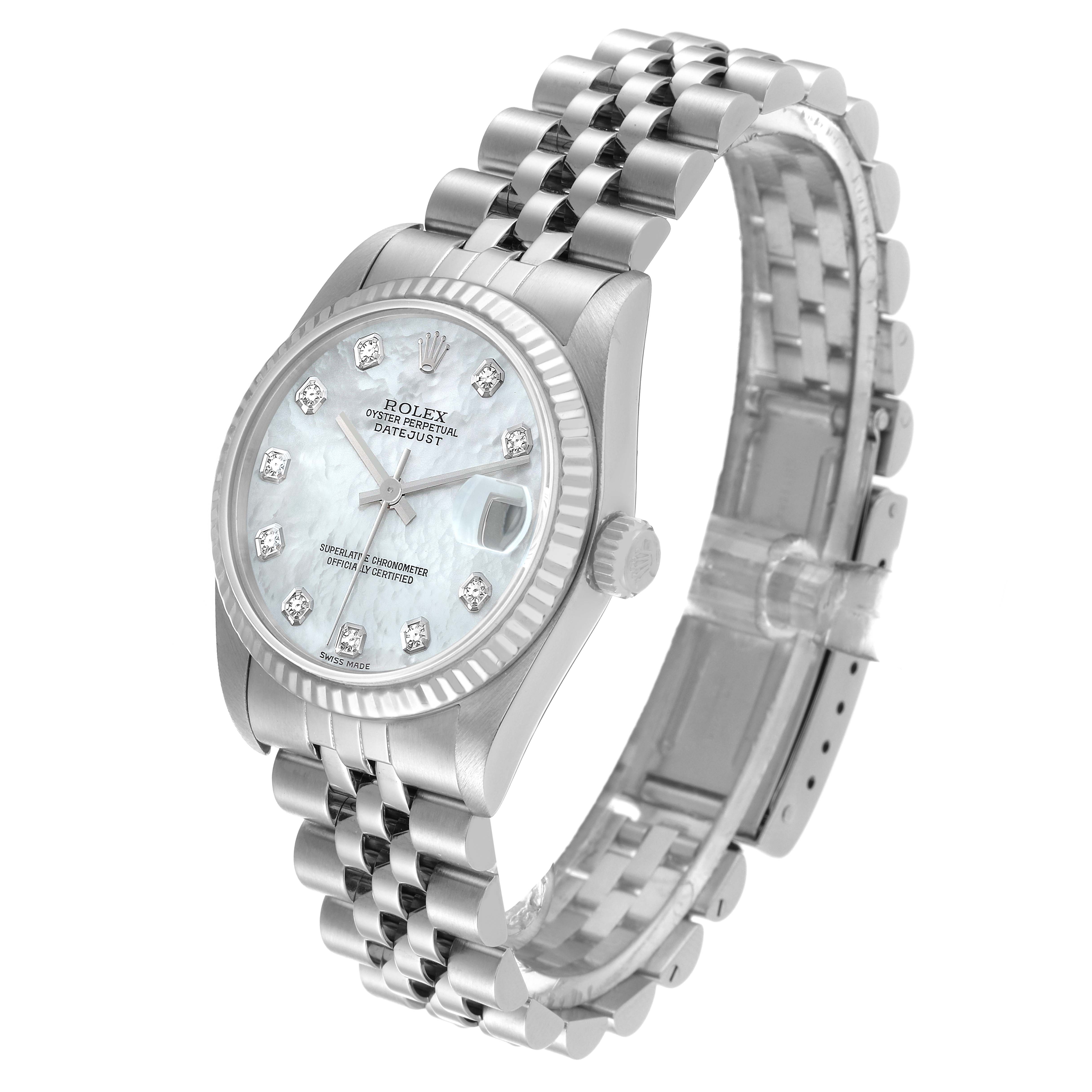 The image shows a Mid-Size Rolex Datejust watch at an angle showcasing its dial, case, crown, and stainless steel bracelet.