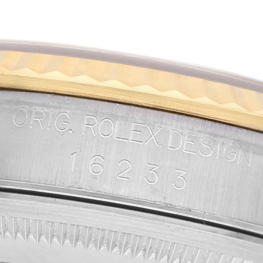 The image shows the side engraving of a Rolex Datejust 16233 Men's Steel and Gold (two tone) White Dial model, detailing "ORIG. ROLEX DESIGN 16233" on the case.