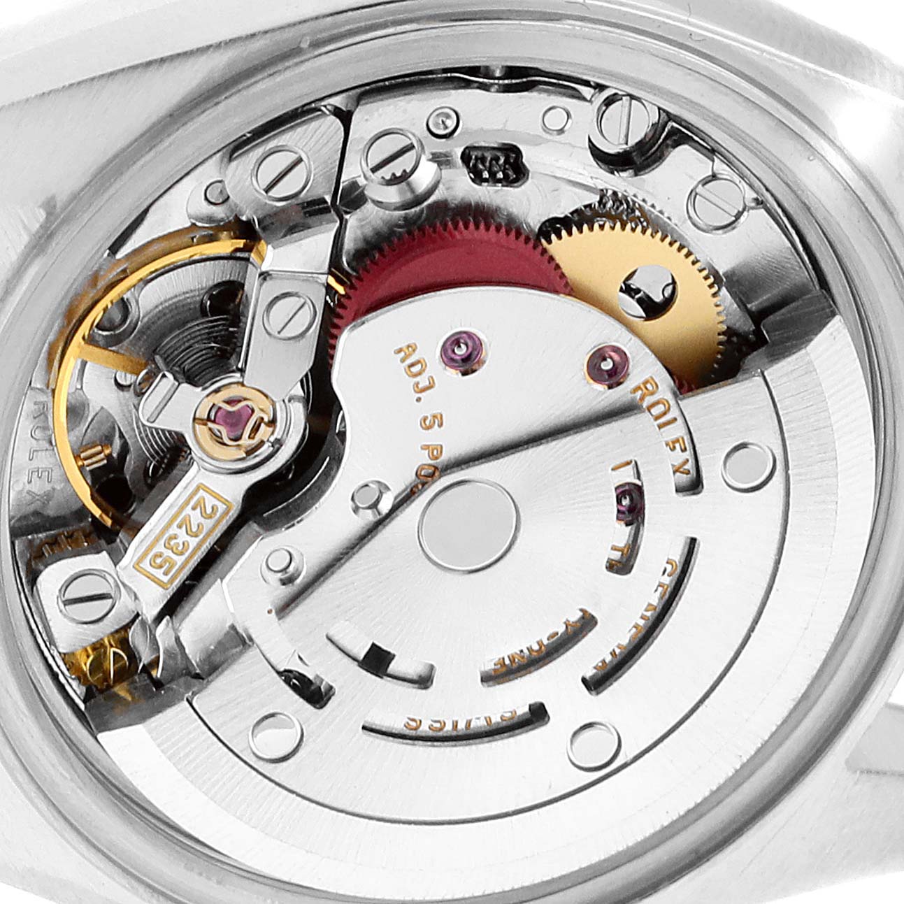 This is a close-up view of the movement mechanism of a Rolex Datejust 79173 Women's Steel and Gold (two tone) Mother of Pearl Dial 79173 Women's Steel and Gold (two tone) Mother of Pearl Dial watch, showcasing its intricate components and gears.