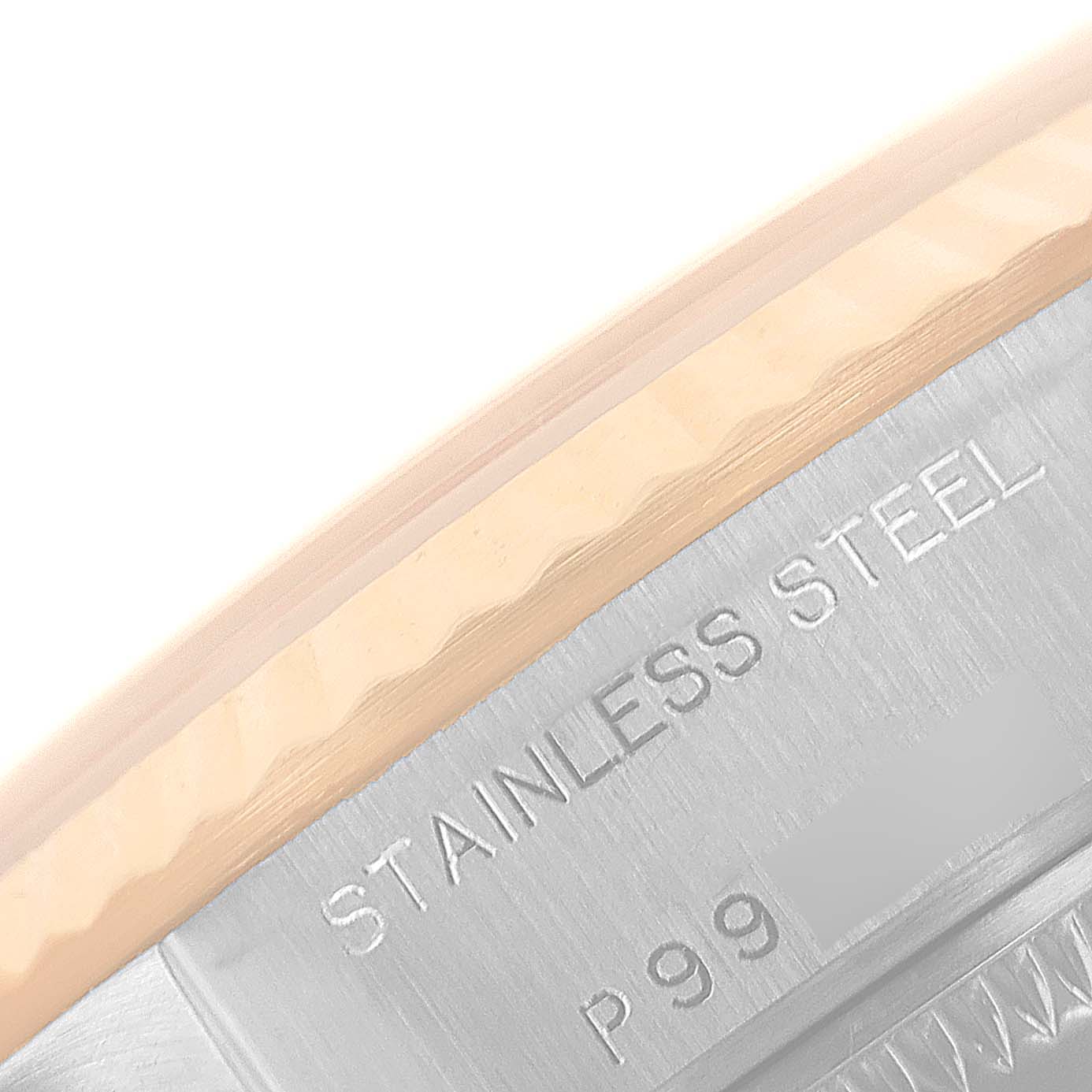 This image shows a close-up of the stainless steel case and edge of the bezel of a Rolex Datejust 79173 Women's Steel and Gold (two tone) Mother of Pearl Dial 79173 Women's Steel and Gold (two tone) Mother of Pearl Dial watch.