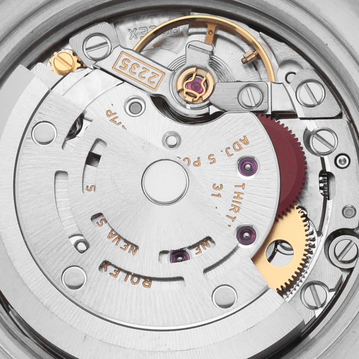 The image shows the internal movement of a Rolex Datejust 179173 Women's Steel and Gold (two tone) White Dial 179173 Women's Steel and Gold (two tone) White Dial watch, highlighting gears and screws from a top-down angle.