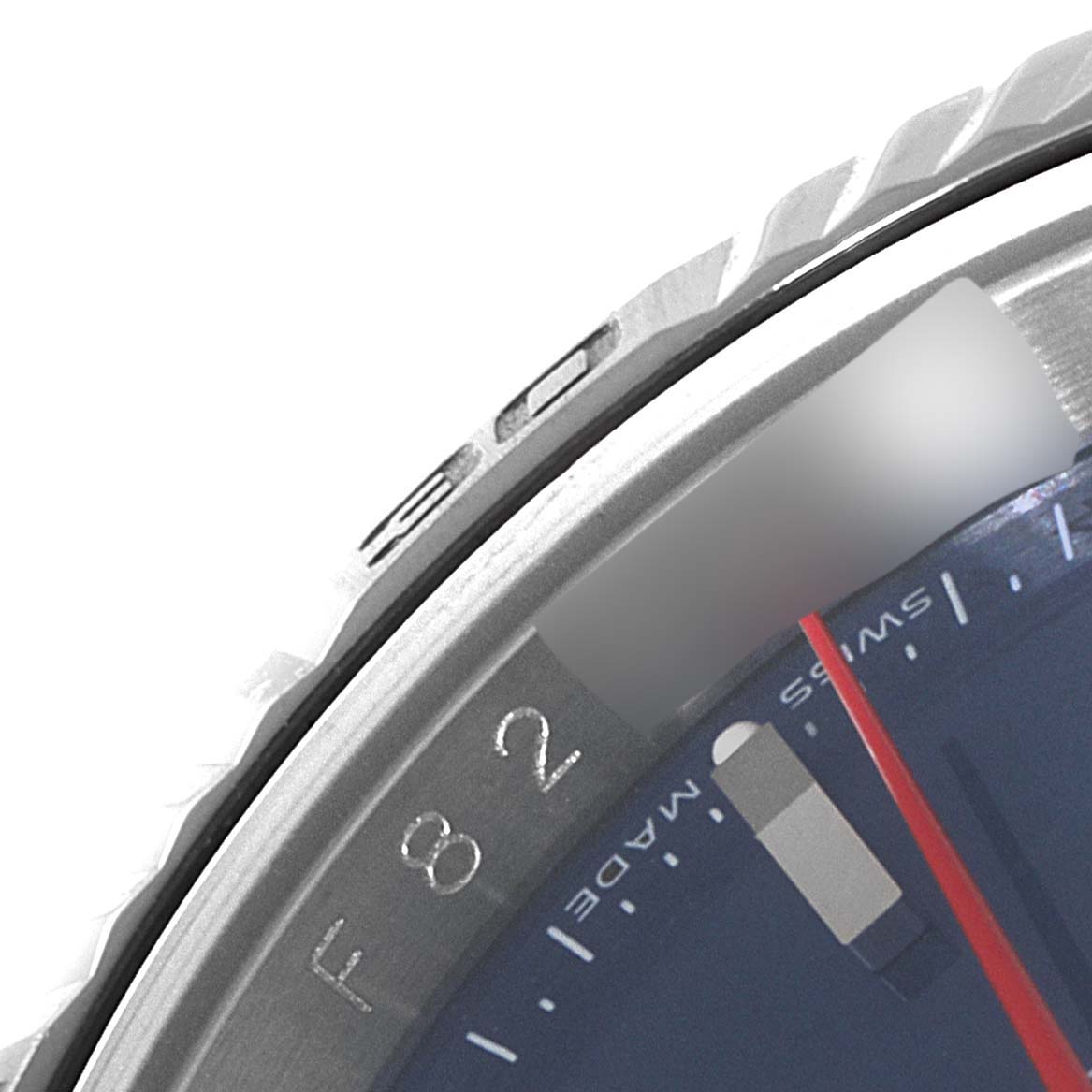 This close-up image of a Rolex Turn-o-Graph 116264 Men
s Stainless Steel Blue Dial 116264 Men
s Stainless Steel Blue Dial watch shows the bezel, part of the dial, and the second hand.