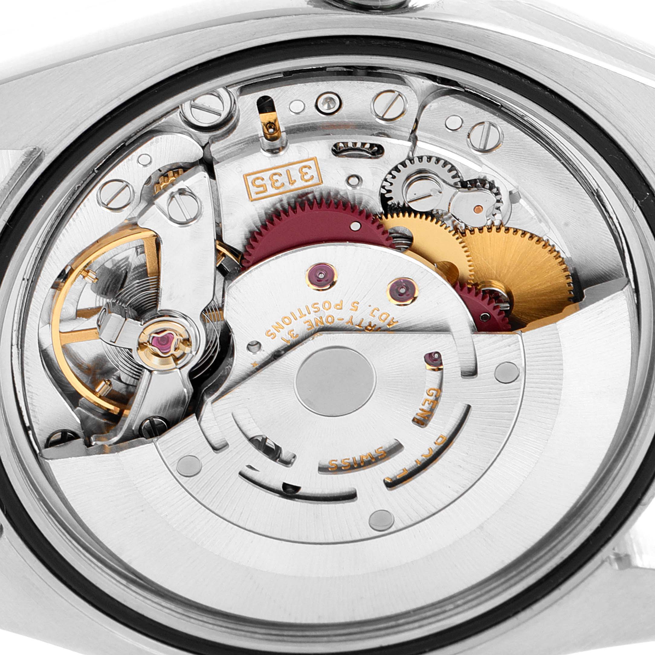 The image shows the intricate inner mechanism of a Rolex Turn-o-Graph 116264 Men
s Stainless Steel Blue Dial 116264 Men
s Stainless Steel Blue Dial watch from a close-up, top-down angle.