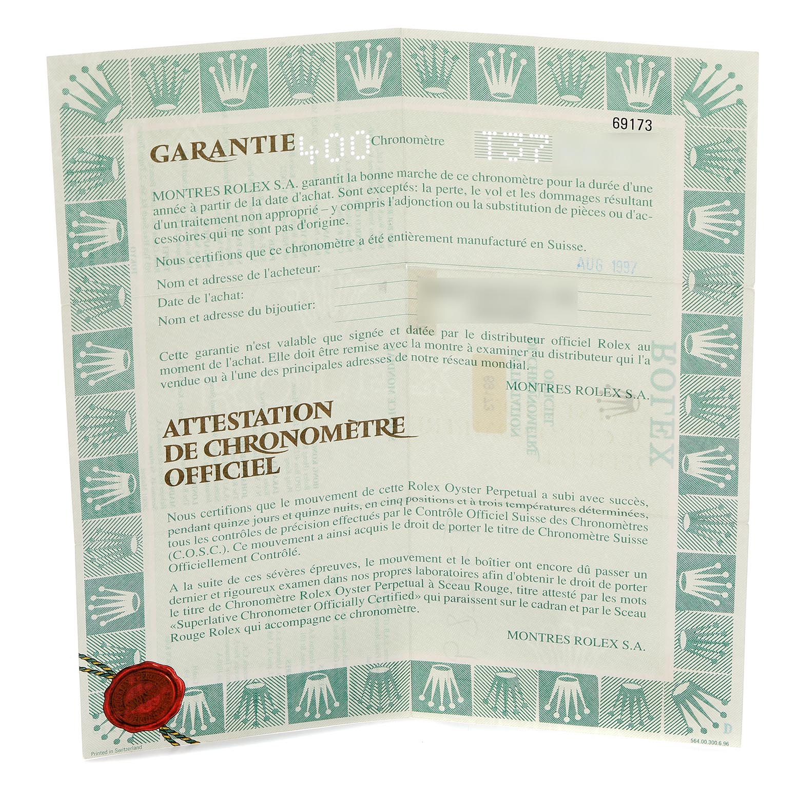 The image shows the warranty and chronometer certificate for a Rolex Datejust 69173 Women's Steel and Gold (two tone) White Dial 69173 Women's Steel and Gold (two tone) White Dial, featuring text and a patterned border.