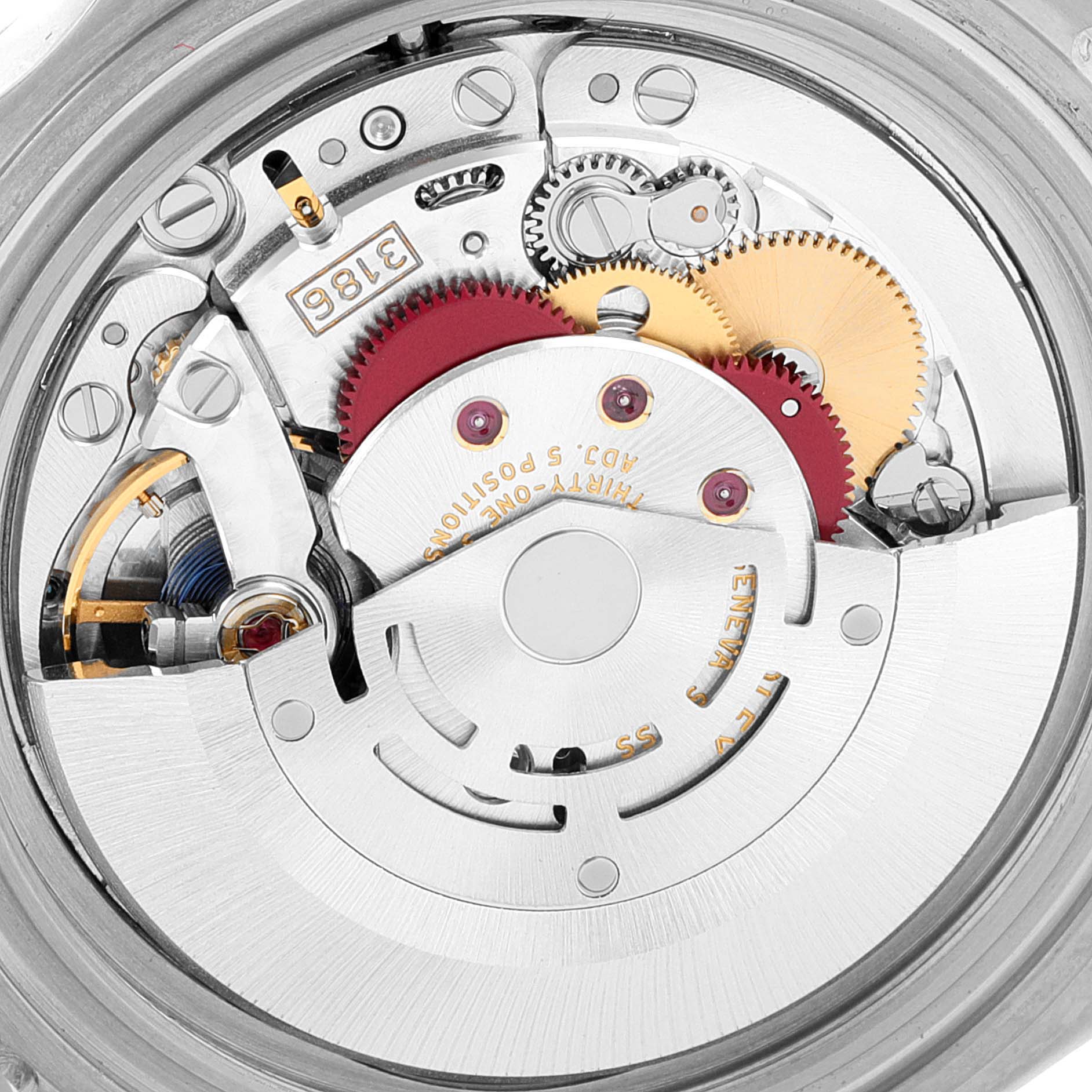 The image shows the inner mechanical movement of a Rolex Explorer 16570 Men
s Stainless Steel White Dial 16570 Men
s Stainless Steel White Dial watch, focusing on the gears and components.
