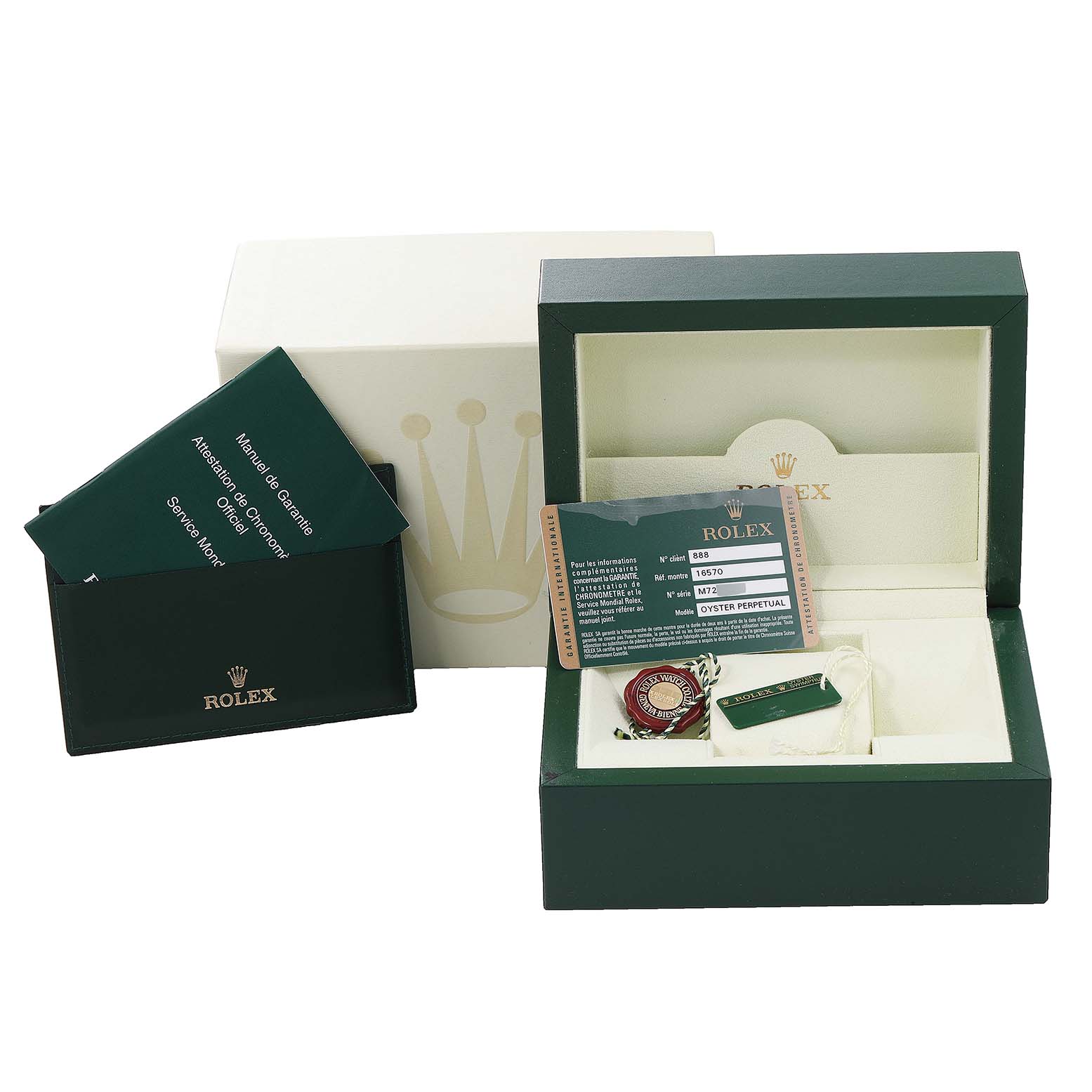 The image shows the accessories and packaging of a Rolex Explorer 16570 Men
s Stainless Steel White Dial 16570 Men
s Stainless Steel White Dial watch, including the box, warranty card, and manuals.