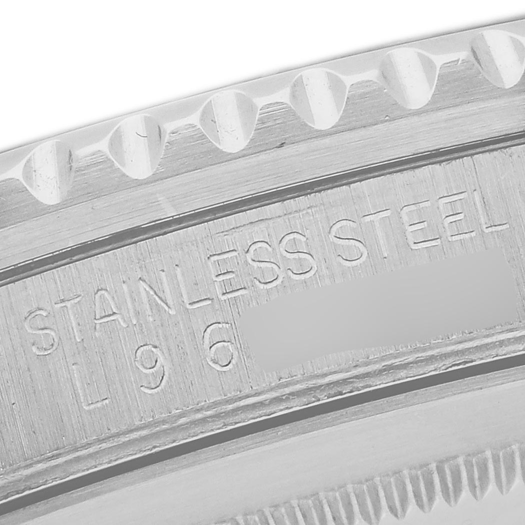 The image shows the side view of a stainless steel case with engraved text on the Rolex GMT-Master 16700 Men's Stainless Steel Black Dial 16700 Men's Stainless Steel Black Dial watch.