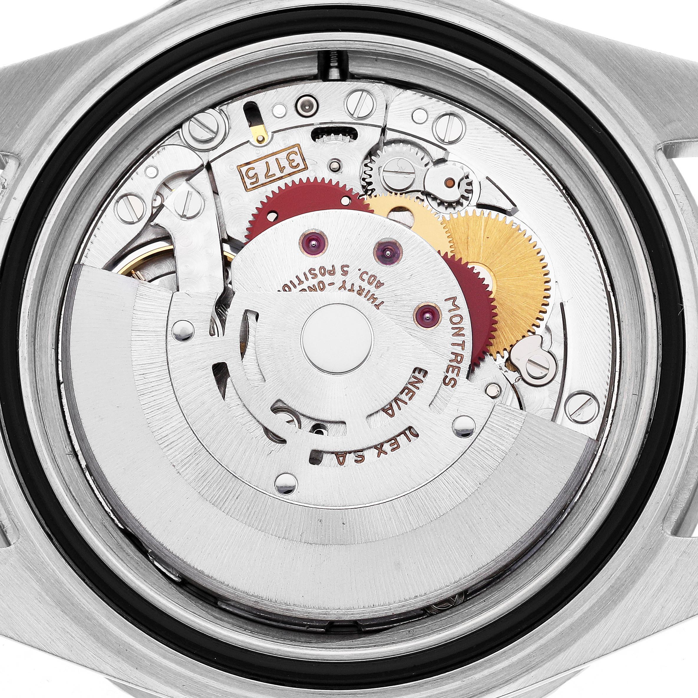 The image shows the movement of a Rolex GMT-Master 16700 Men's Stainless Steel Black Dial 16700 Men's Stainless Steel Black Dial, viewed from the back, highlighting the intricate gears and components.