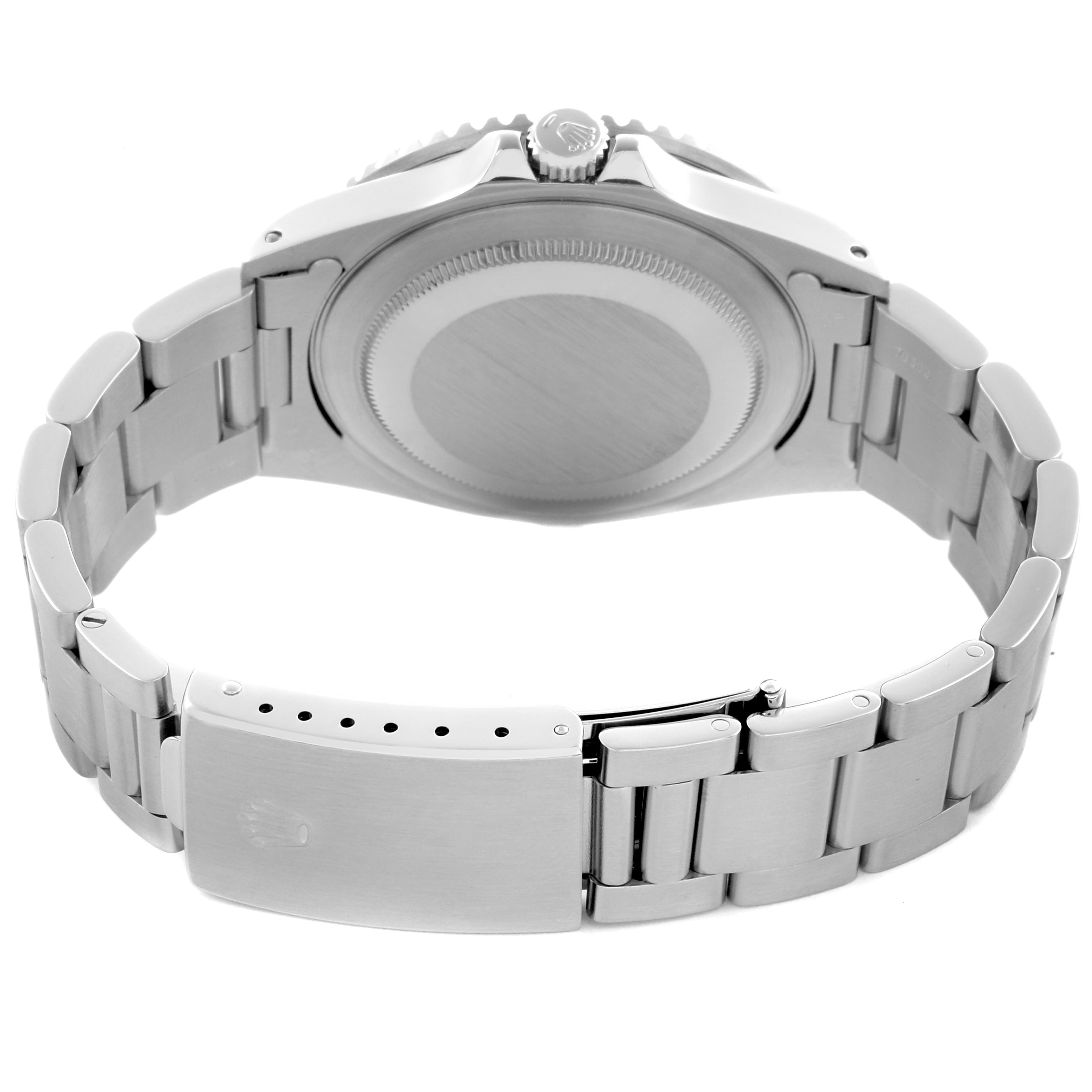 The image shows the back view of a Rolex GMT-Master 16700 Men's Stainless Steel Black Dial 16700 Men's Stainless Steel Black Dial, highlighting the case back, crown, and stainless steel bracelet with clasp.