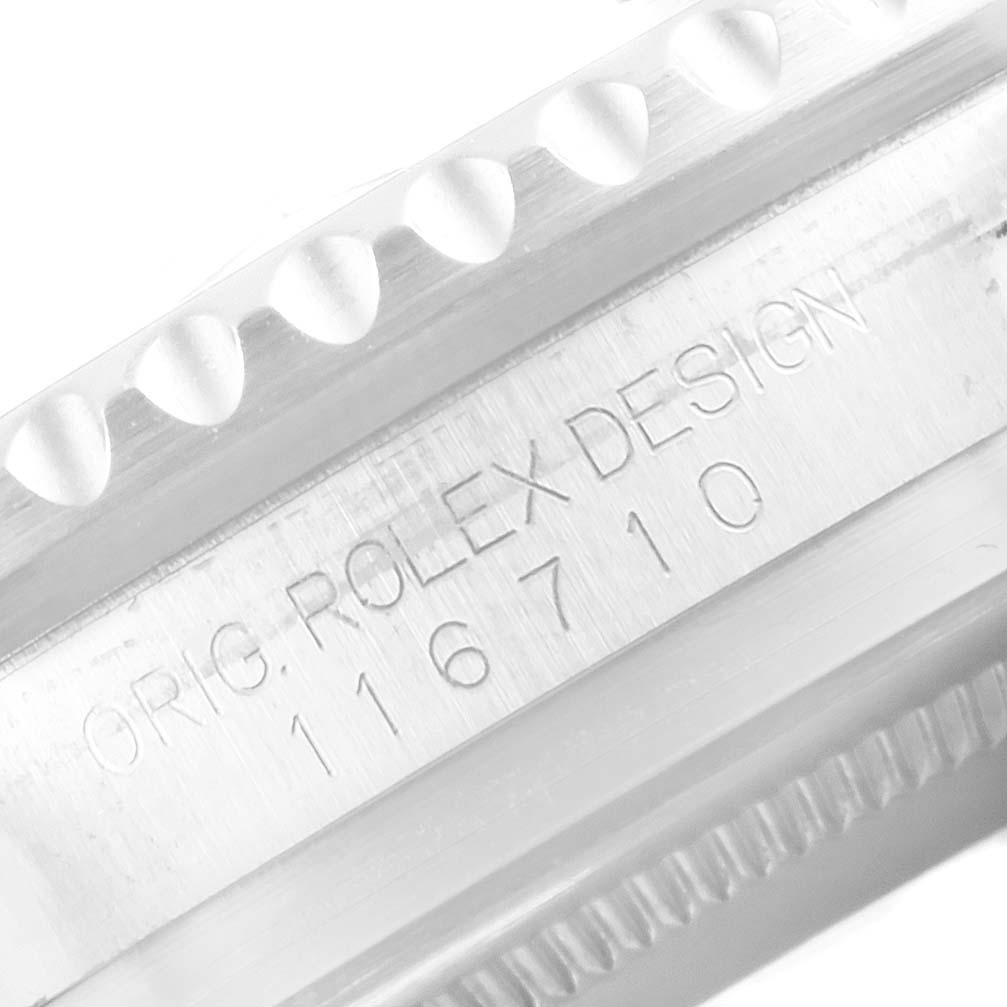 This close-up image shows the case side and the model number engraving of a Rolex GMT-Master 116710 Men's Stainless Steel Black Dial 116710 Men's Stainless Steel Black Dial watch.