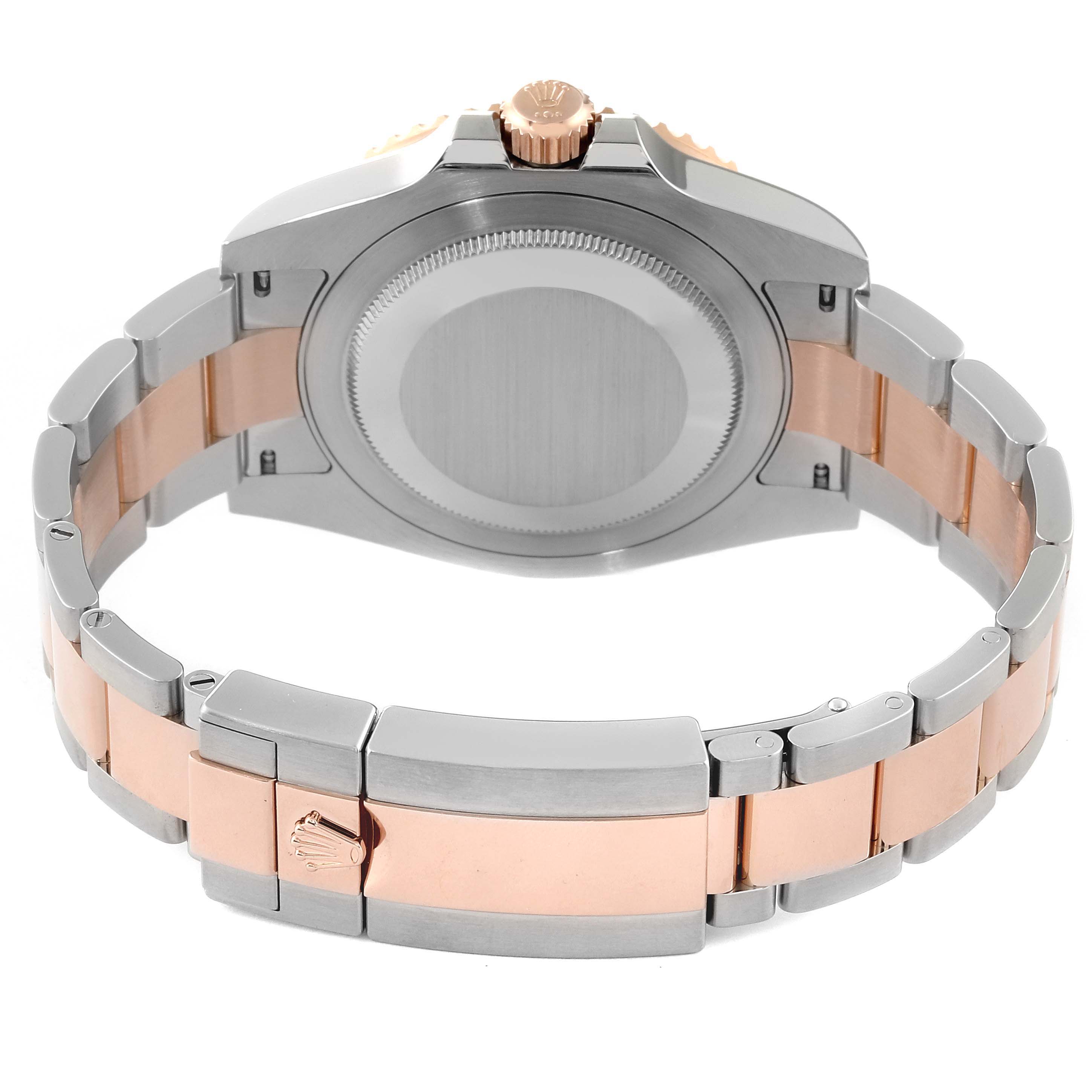 This image shows the back view of the Rolex GMT-Master 126711CHNR Men's Steel and Gold (two tone) Black Dial 126711CHNR Men's Steel and Gold (two tone) Black Dial watch, focusing on the case back, crown, and bracelet.