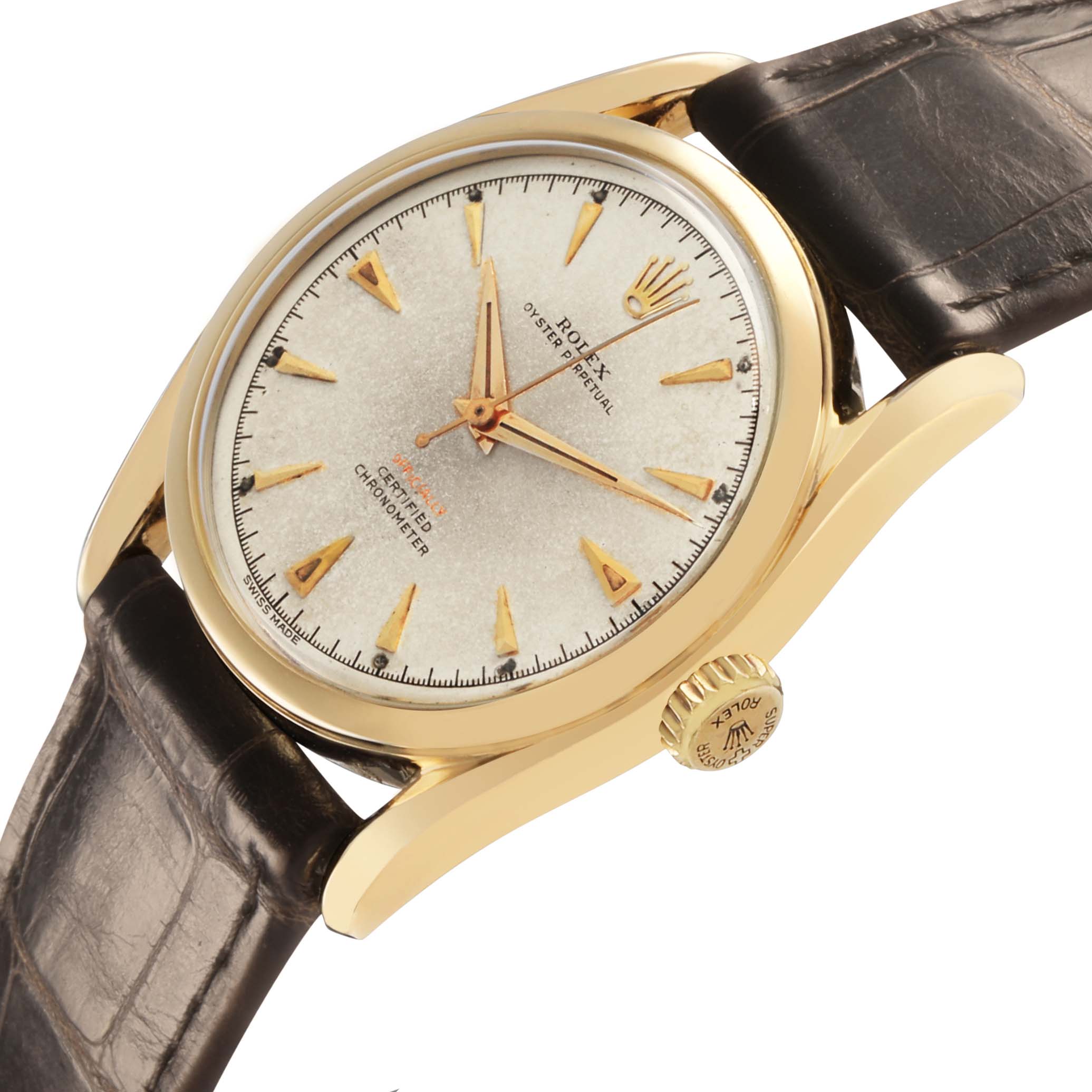 The Rolex Oyster Perpetual 6085 Men's Yellow Gold Champagne Dial watch is shown at a slight angle, highlighting the dial, case, and crown with a leather strap.