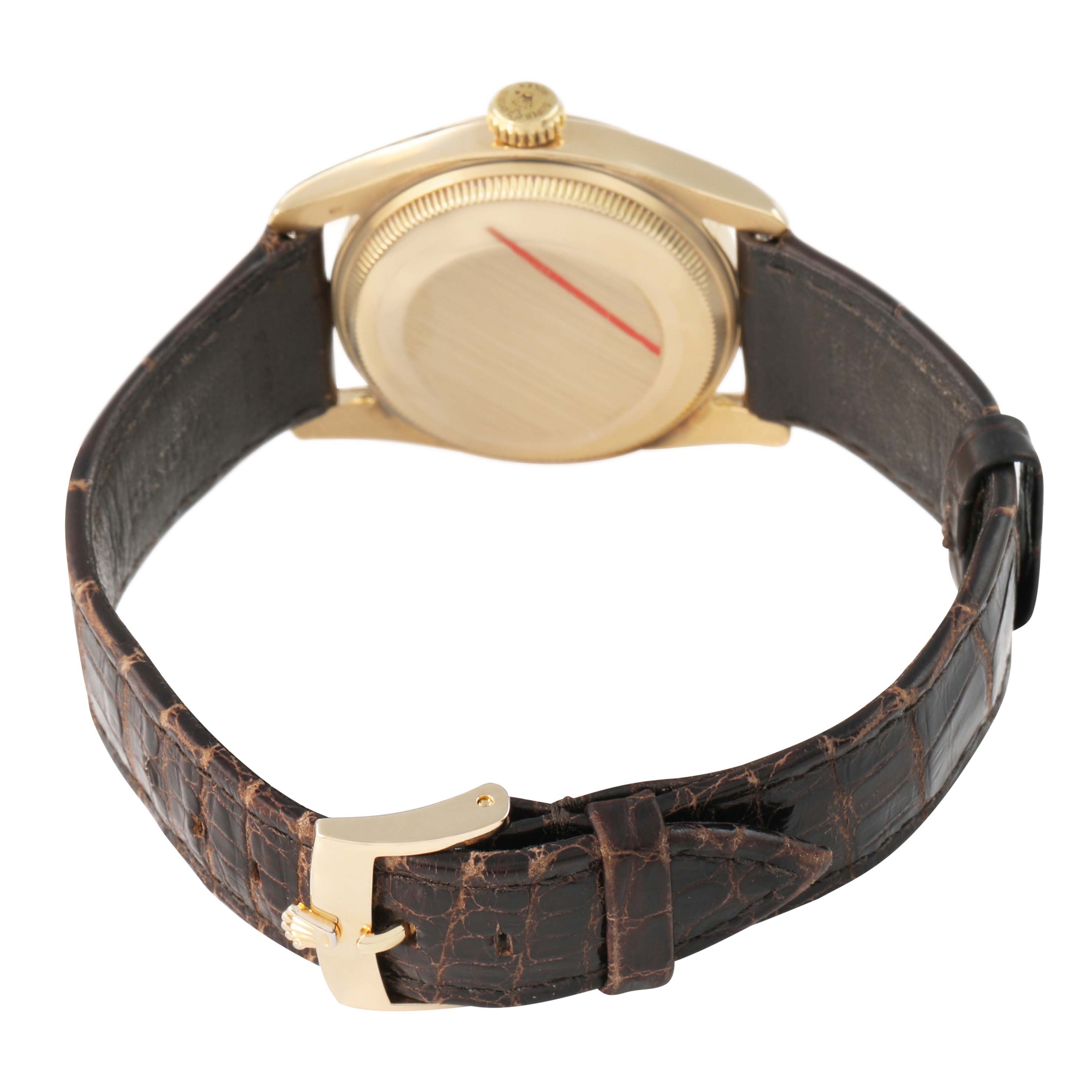 The image shows the back of a Rolex Oyster Perpetual 6085 Men's Yellow Gold Champagne Dial, highlighting the case, crown, and clasp with a leather strap.